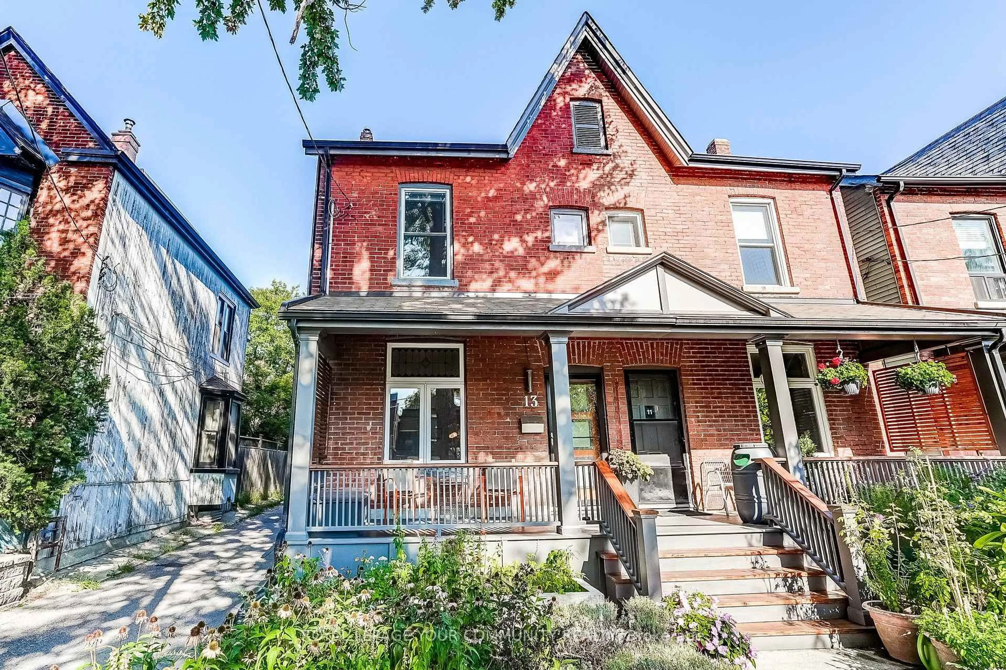 Home with brick exterior material, street for 13 Howland Rd, Toronto Ontario M4K 2Z4