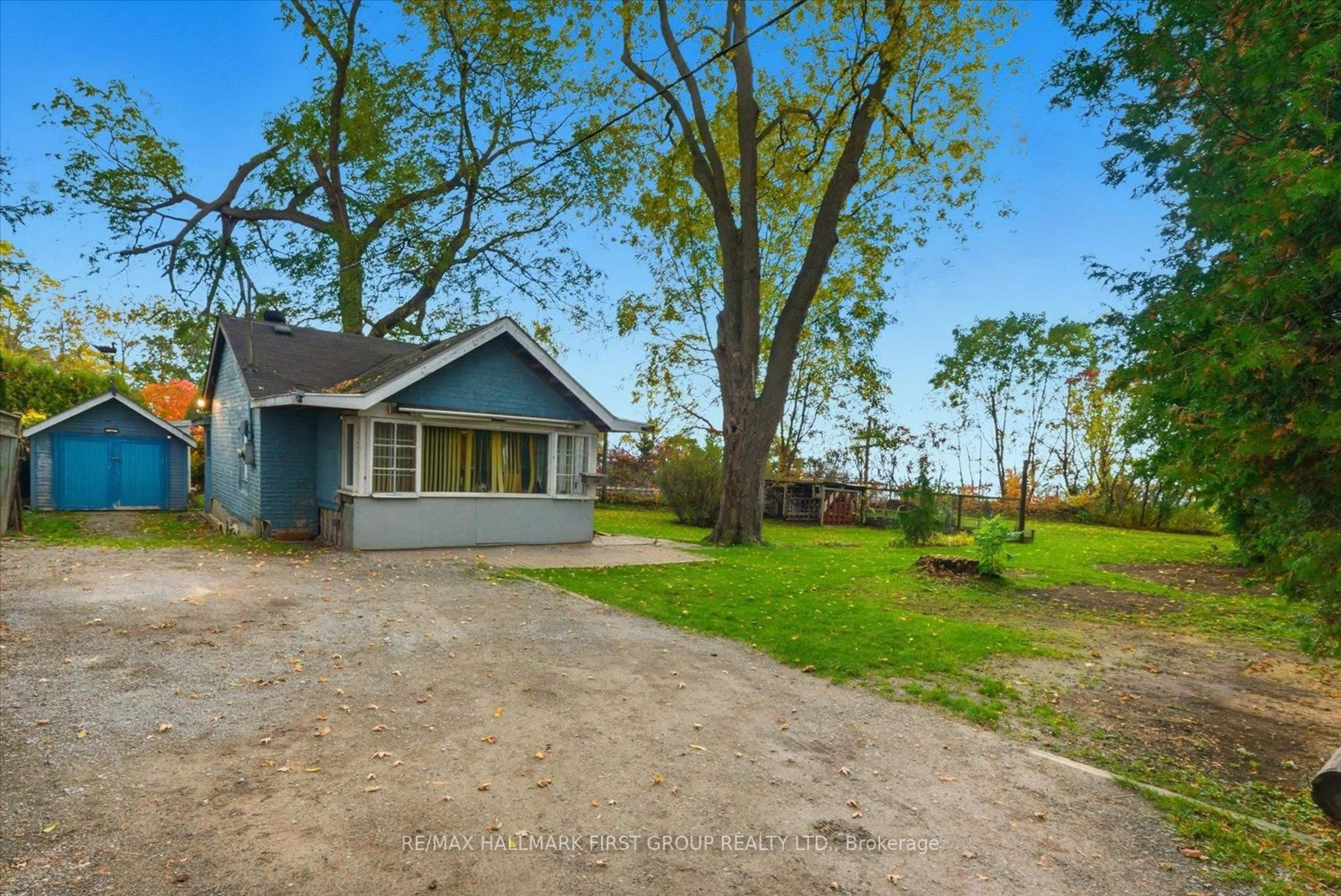 A pic from outside/outdoor area/front of a property/back of a property/a pic from drone, water/lake/river/ocean view for 313 Dyson Rd, Pickering Ontario L1W 2N1