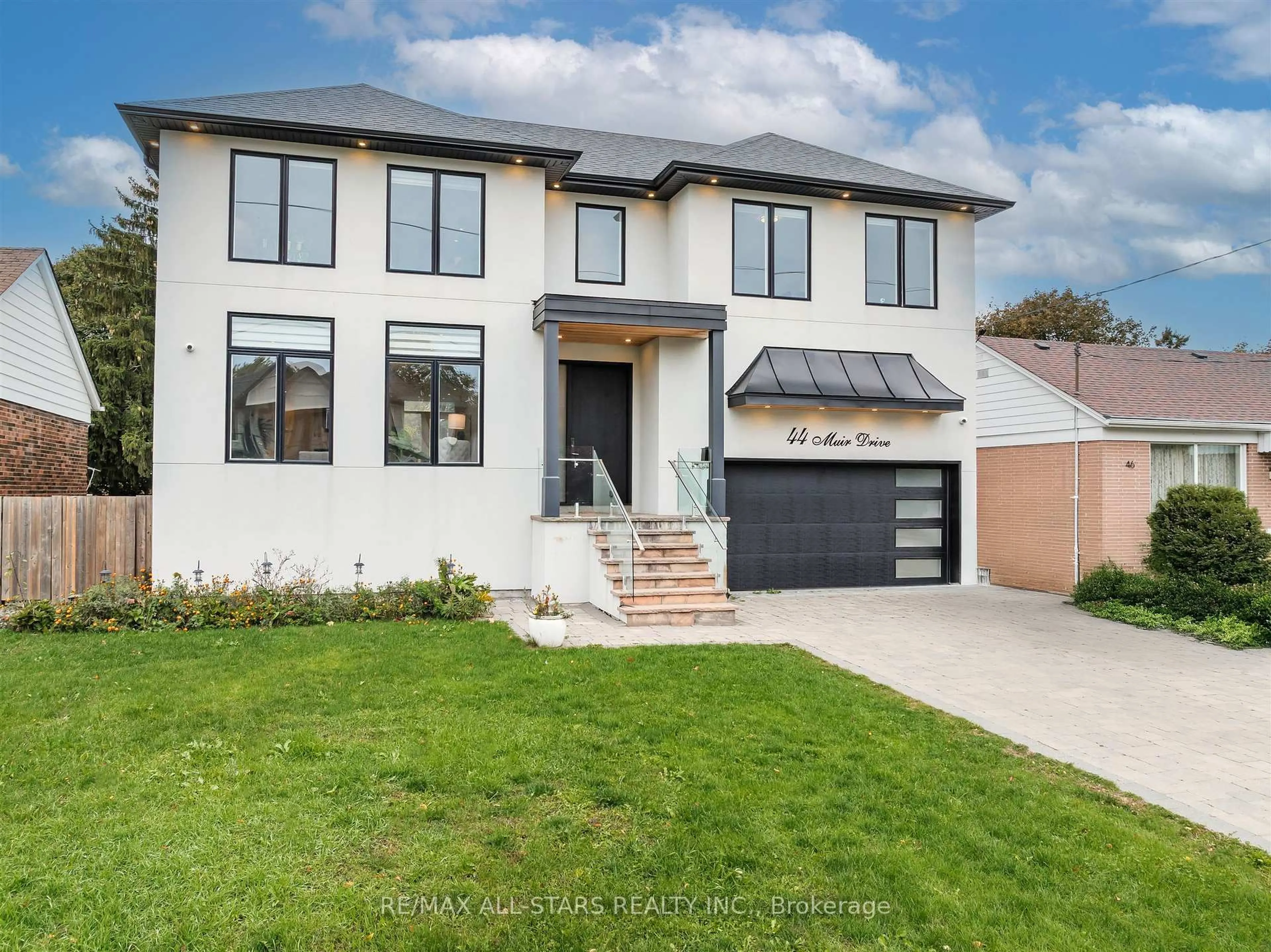 Home with brick exterior material, street for 44 Muir Dr, Toronto Ontario M1M 3B4