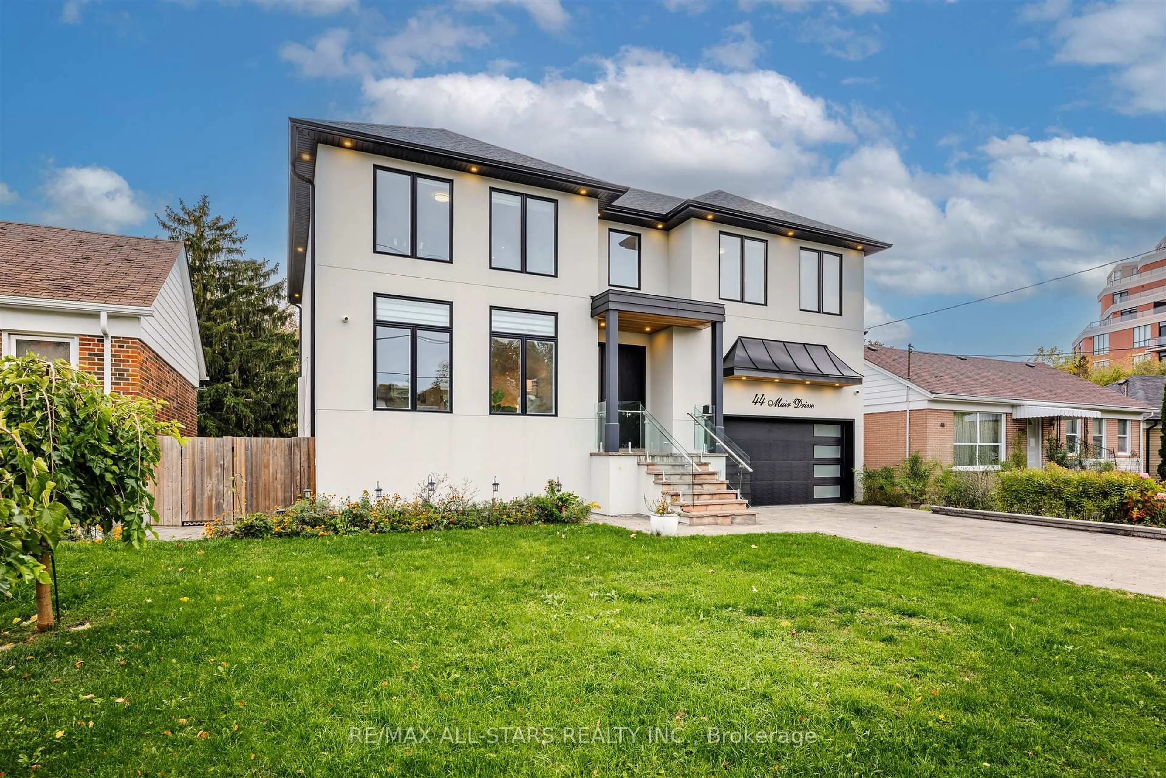 Home with brick exterior material, street for 44 Muir Dr, Toronto Ontario M1M 3B4