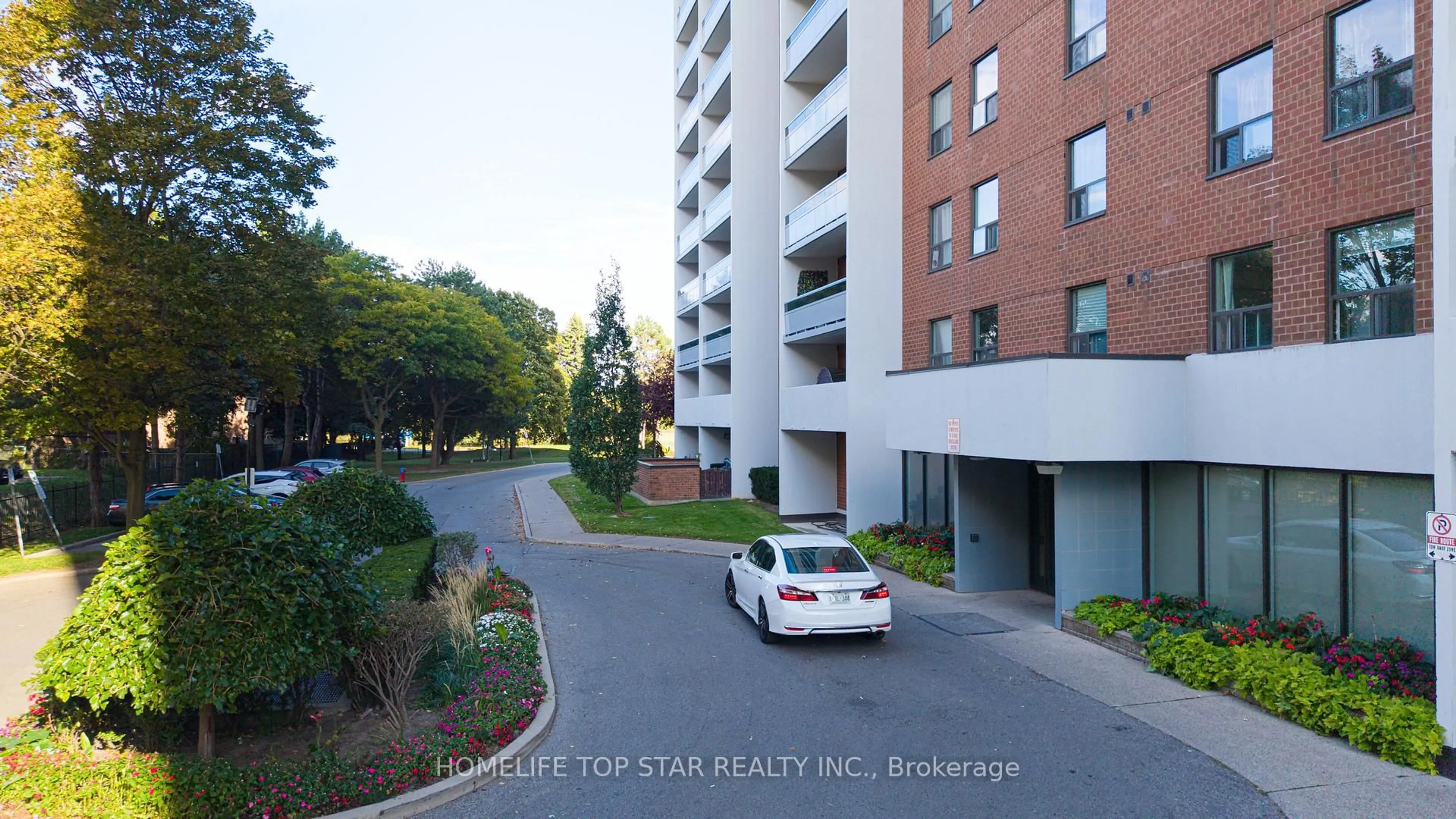 A pic from outside/outdoor area/front of a property/back of a property/a pic from drone, street for 1250 Bridletowne Circ #501, Toronto Ontario M1W 2V1