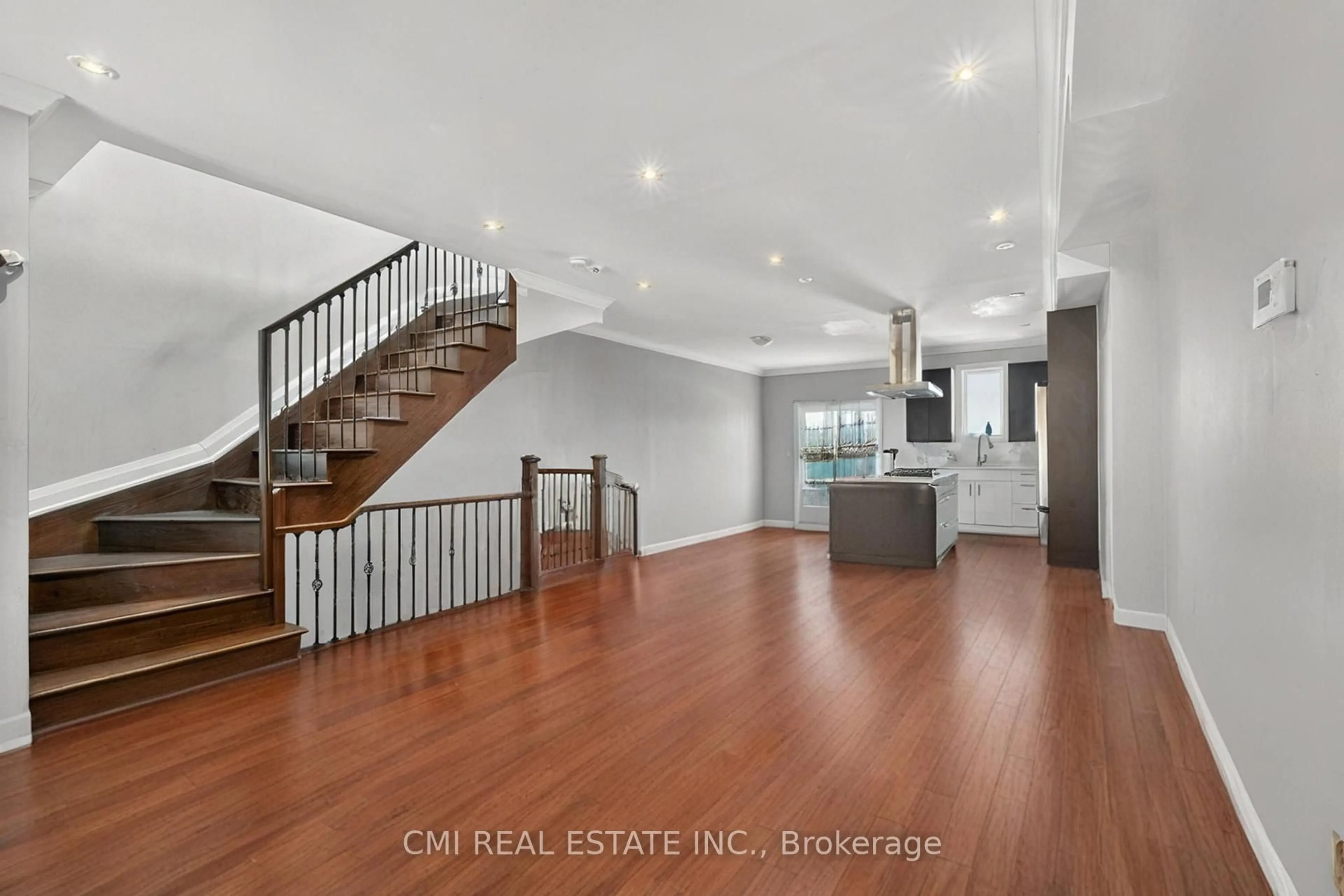 Open concept kitchen, wood/laminate floor for 22 Jeavons Ave, Toronto Ontario M1K 1S8