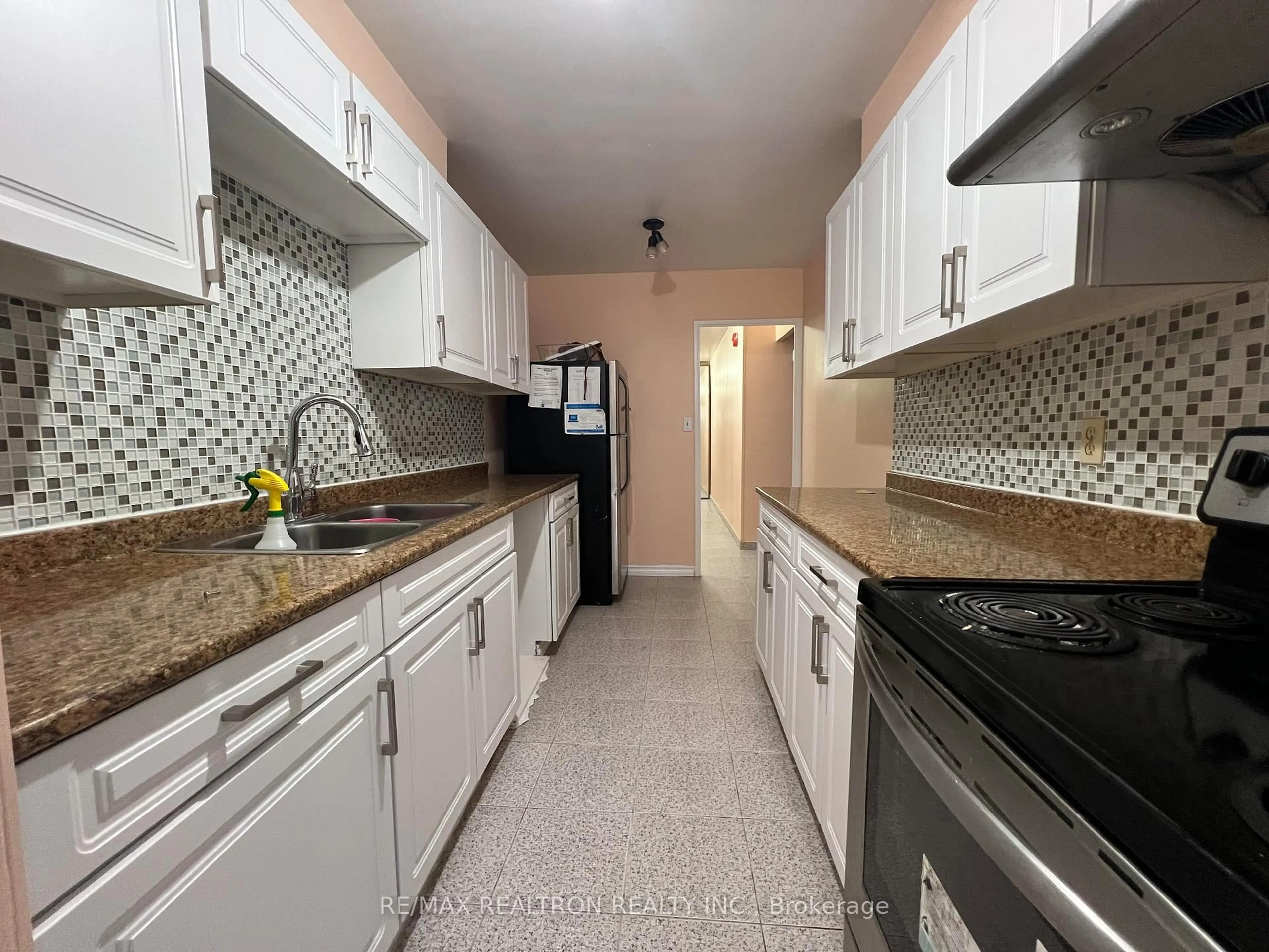 Standard kitchen, ceramic/tile floor for 3 Massey Sq #2103, Toronto Ontario M4C 5L5