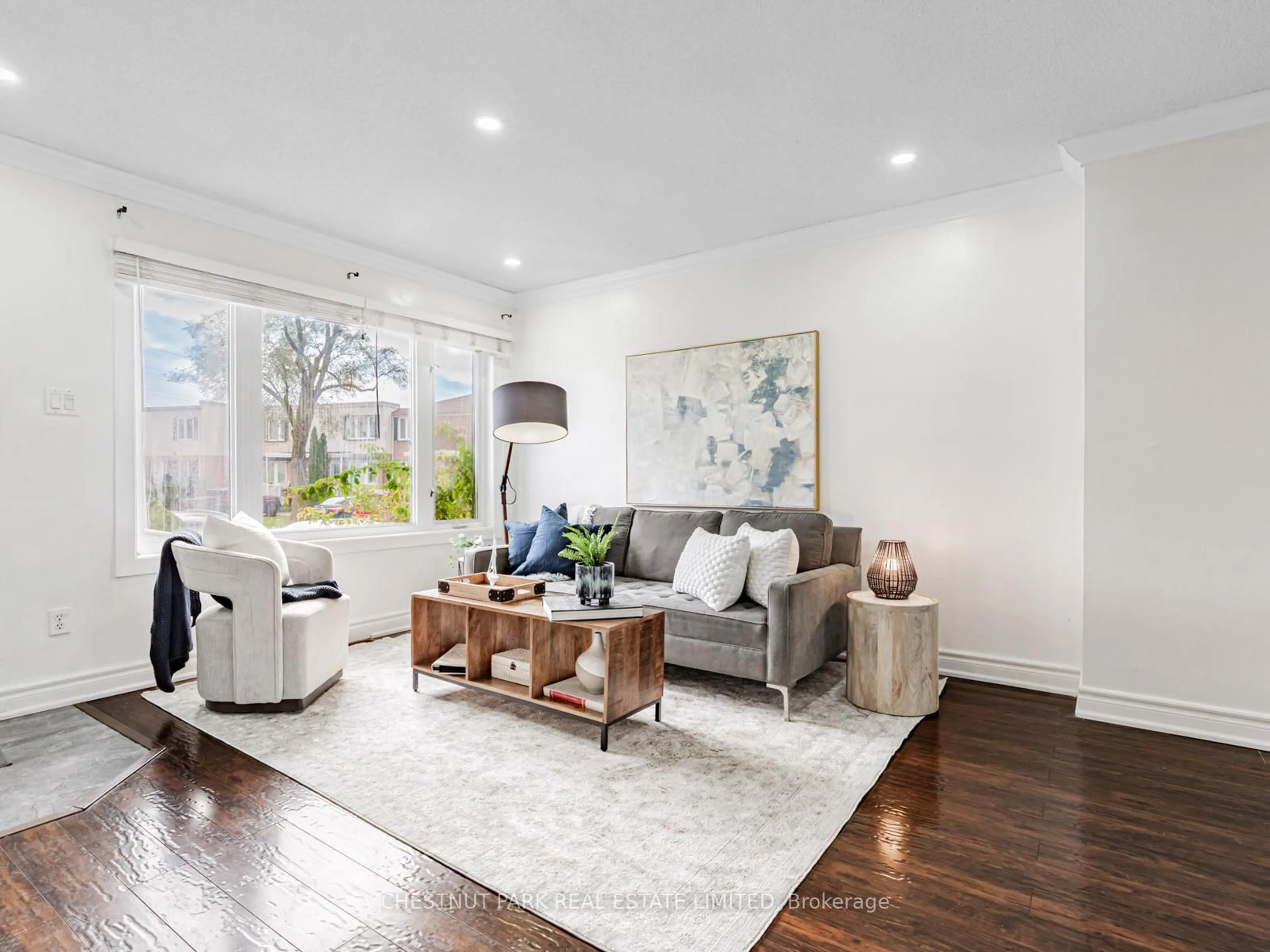 Living room with furniture, wood/laminate floor for 740 Kennedy Rd #8, Toronto Ontario M1K 2C5