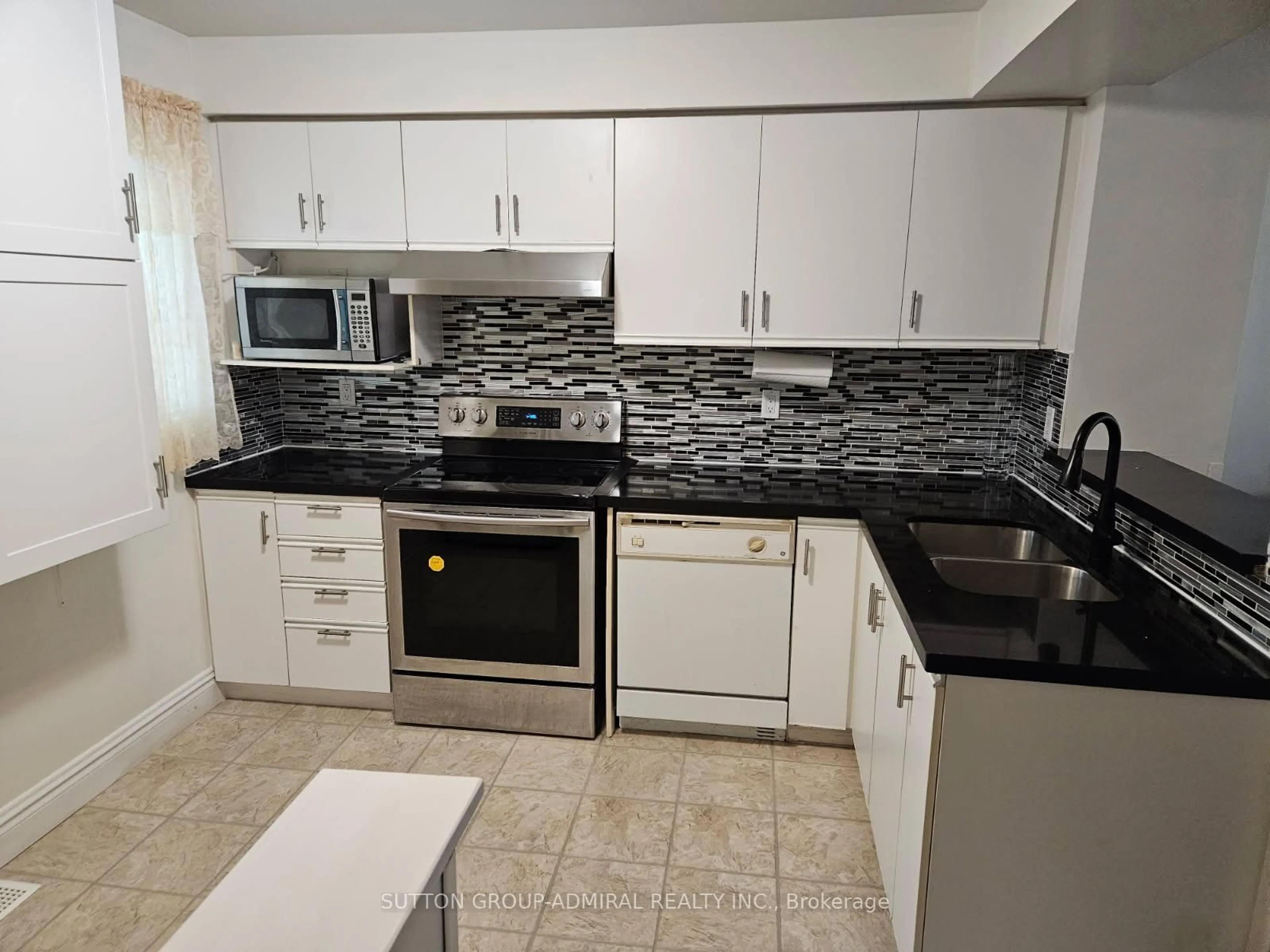 Standard kitchen, ceramic/tile floor for 2 Hedge End Rd #105, Toronto Ontario M1B 5Z8