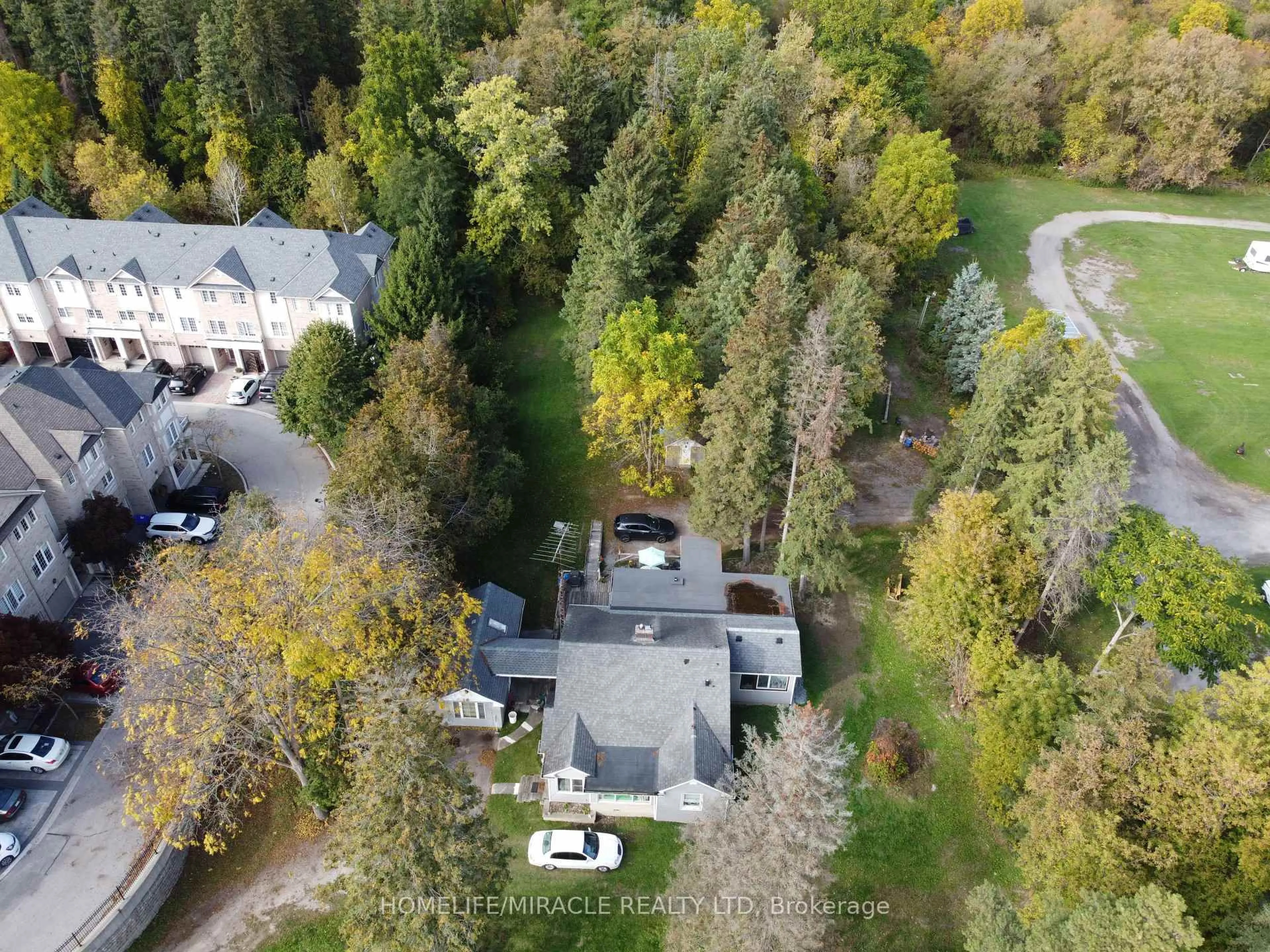 A pic from outside/outdoor area/front of a property/back of a property/a pic from drone, forest/trees view for 1892 Kingston Rd, Pickering Ontario L1V 1C8