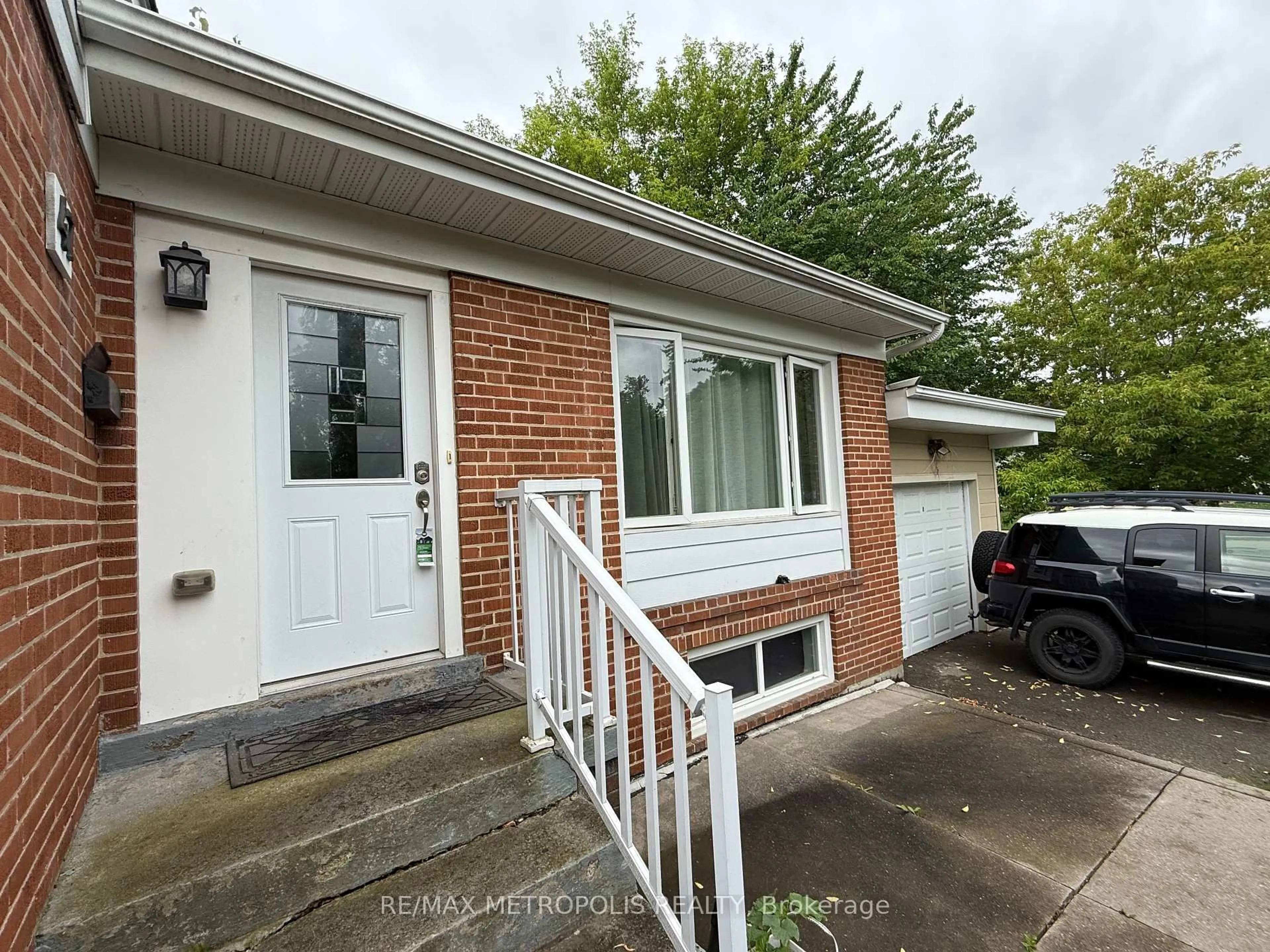 Home with brick exterior material, street for 47 Haileybury Dr, Toronto Ontario M1K 4X7