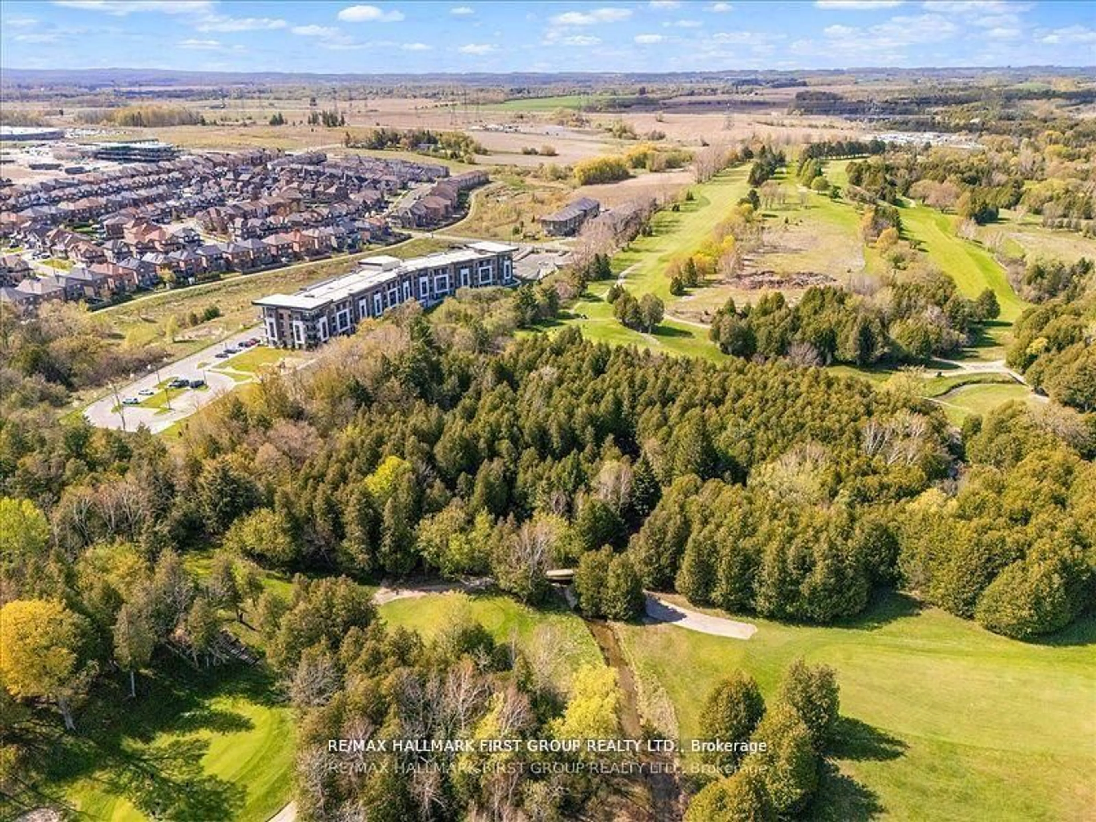A pic from outside/outdoor area/front of a property/back of a property/a pic from drone, forest/trees view for 385 Arctic Red Dr #409, Oshawa Ontario L1L 0W9