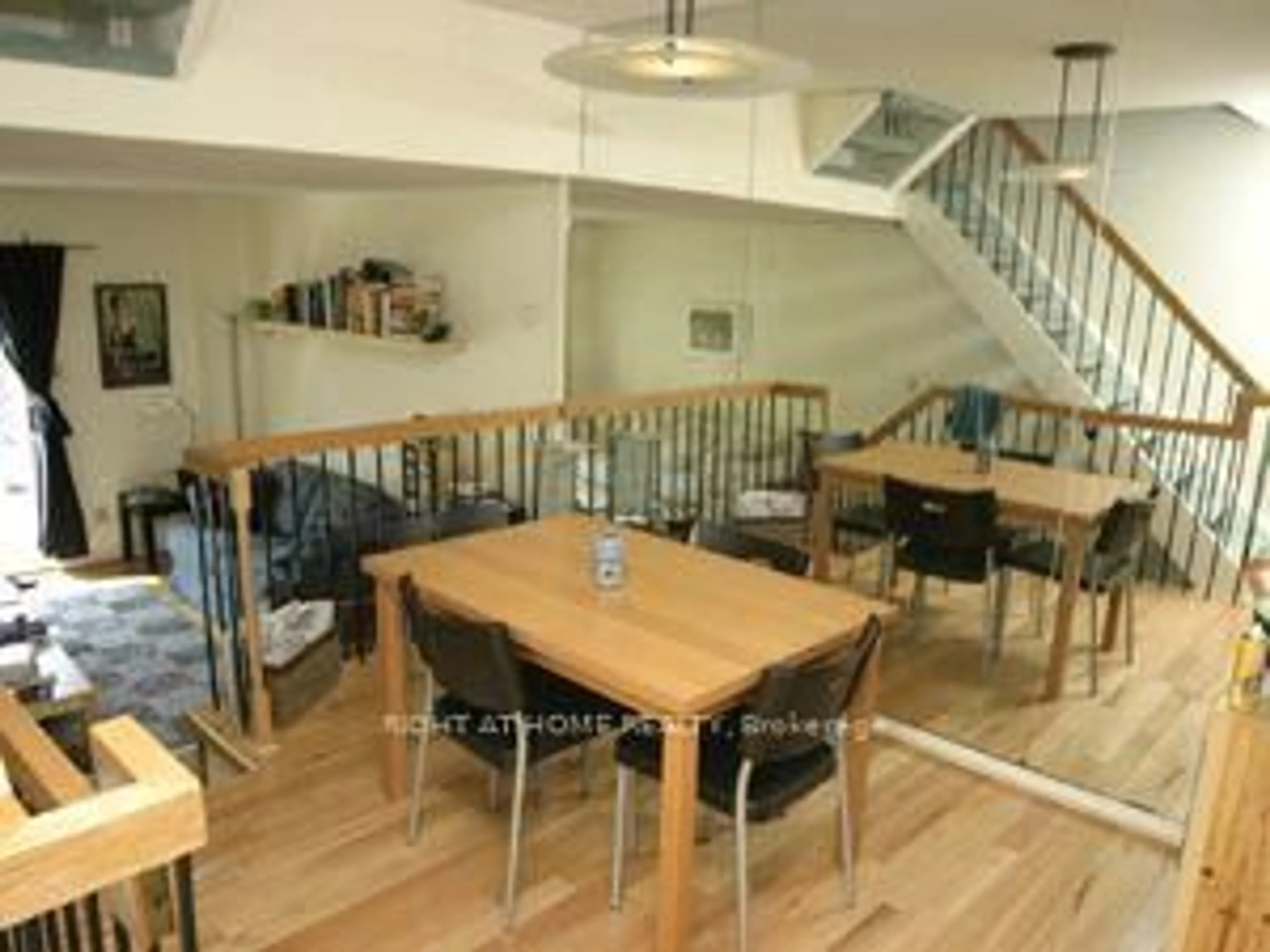 Dining room, wood/laminate floor for 11 Quarry Crt, Toronto Ontario M4J 5A6