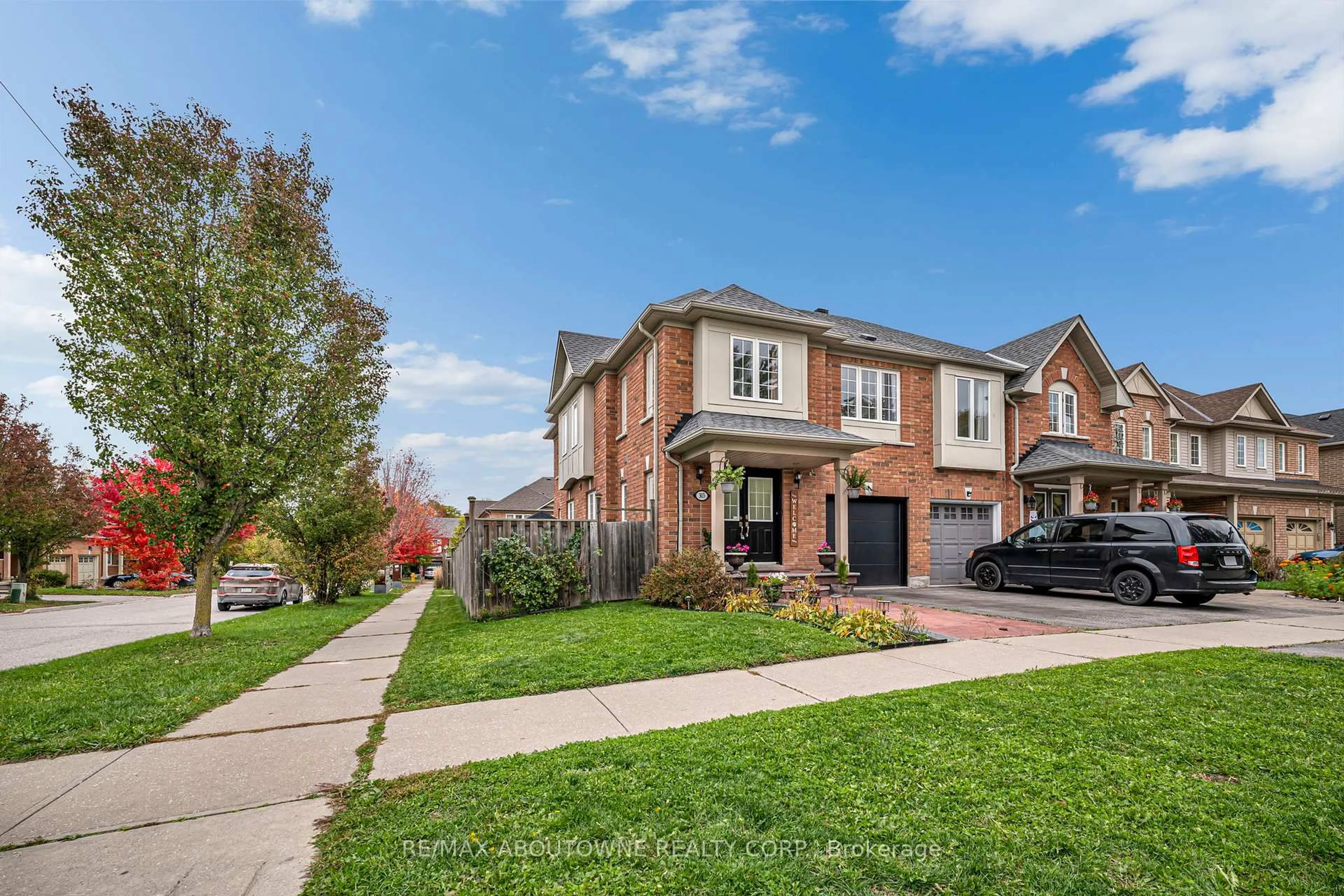 Home with brick exterior material, street for 303 Porte Rd, Ajax Ontario L1S 0A4