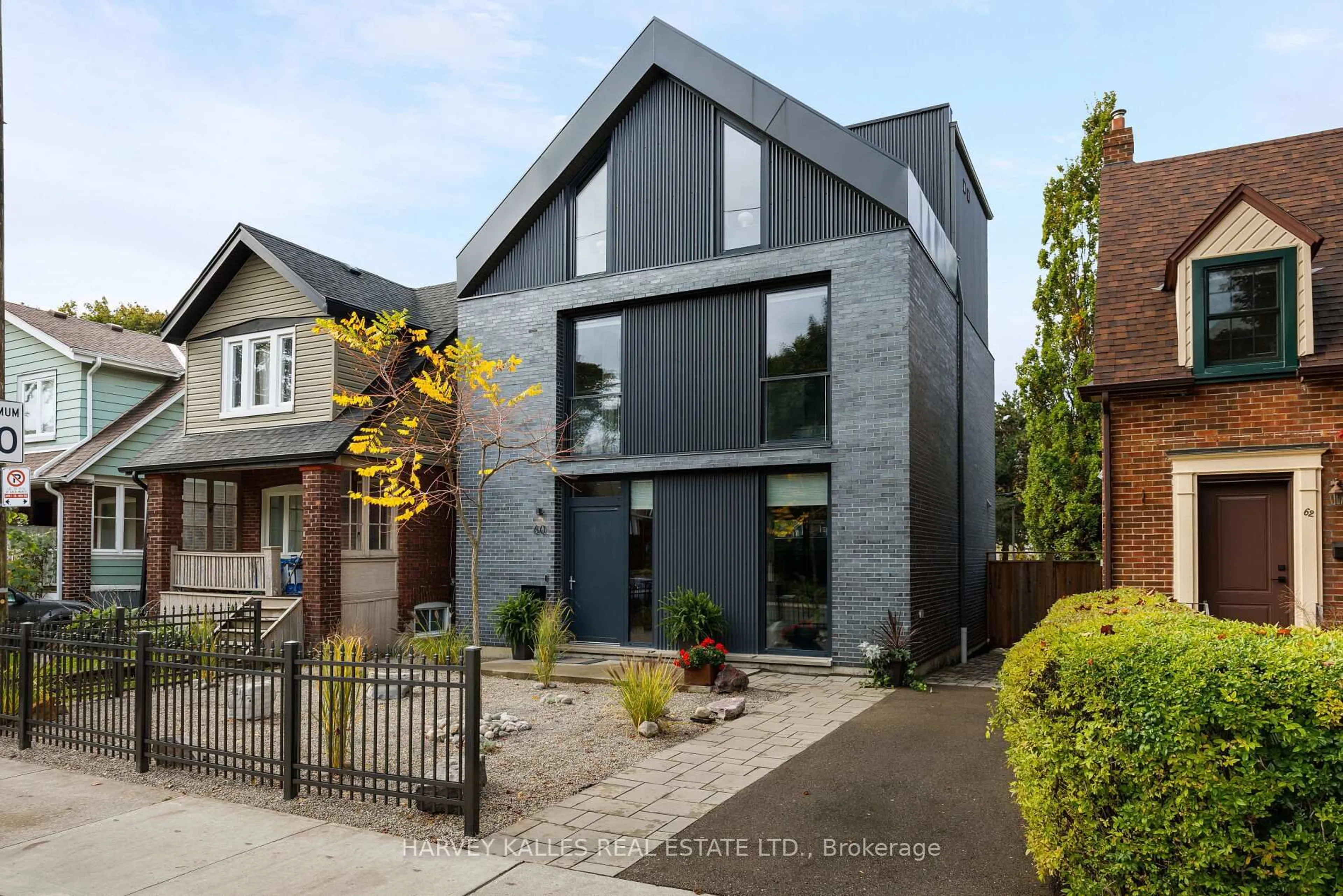 Home with brick exterior material, street for 60 Hiltz Ave, Toronto Ontario M4L 2N5