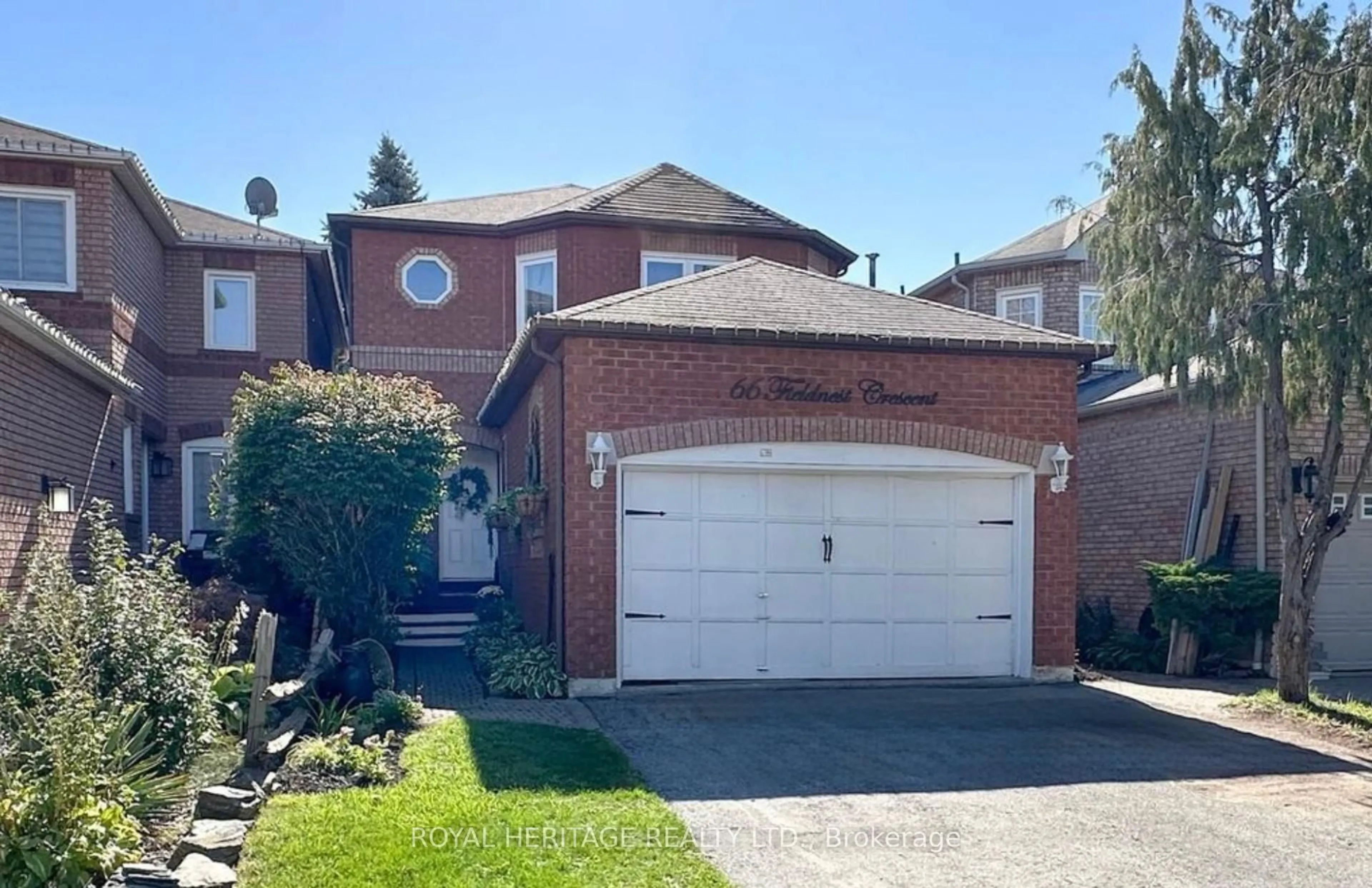 Home with brick exterior material, street for 66 Fieldnest Cres, Whitby Ontario L1R 1Z6