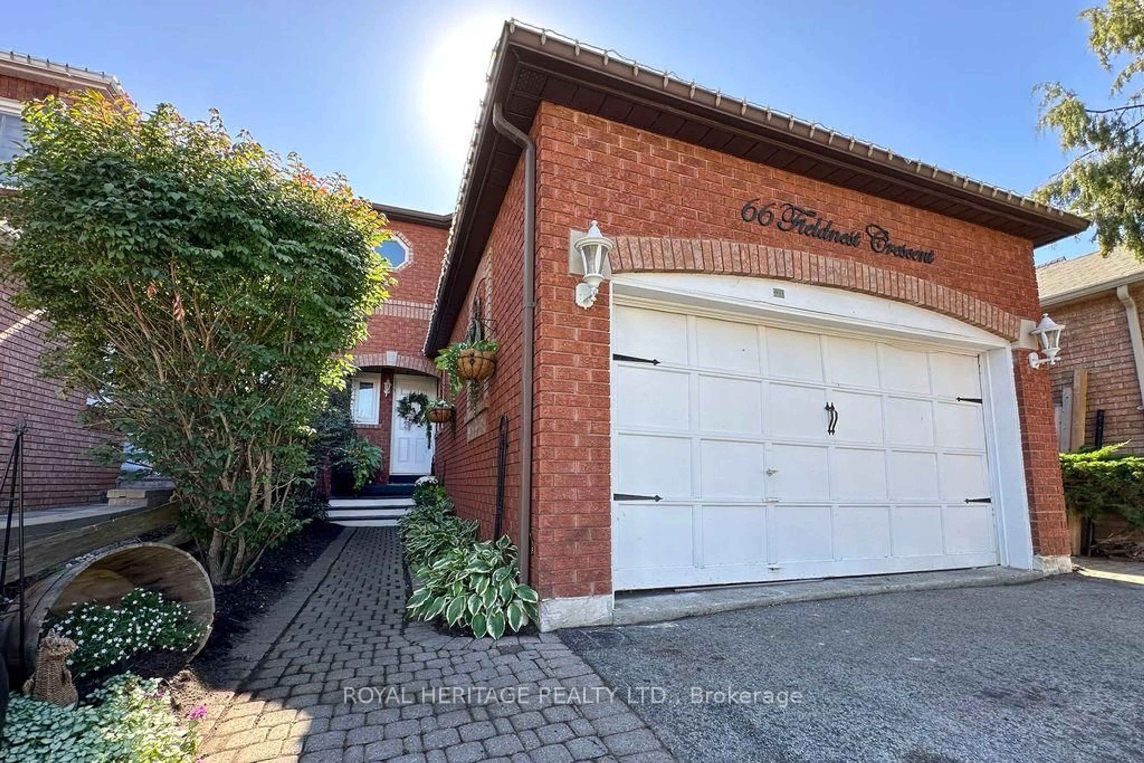 Home with brick exterior material, street for 66 Fieldnest Cres, Whitby Ontario L1R 1Z6