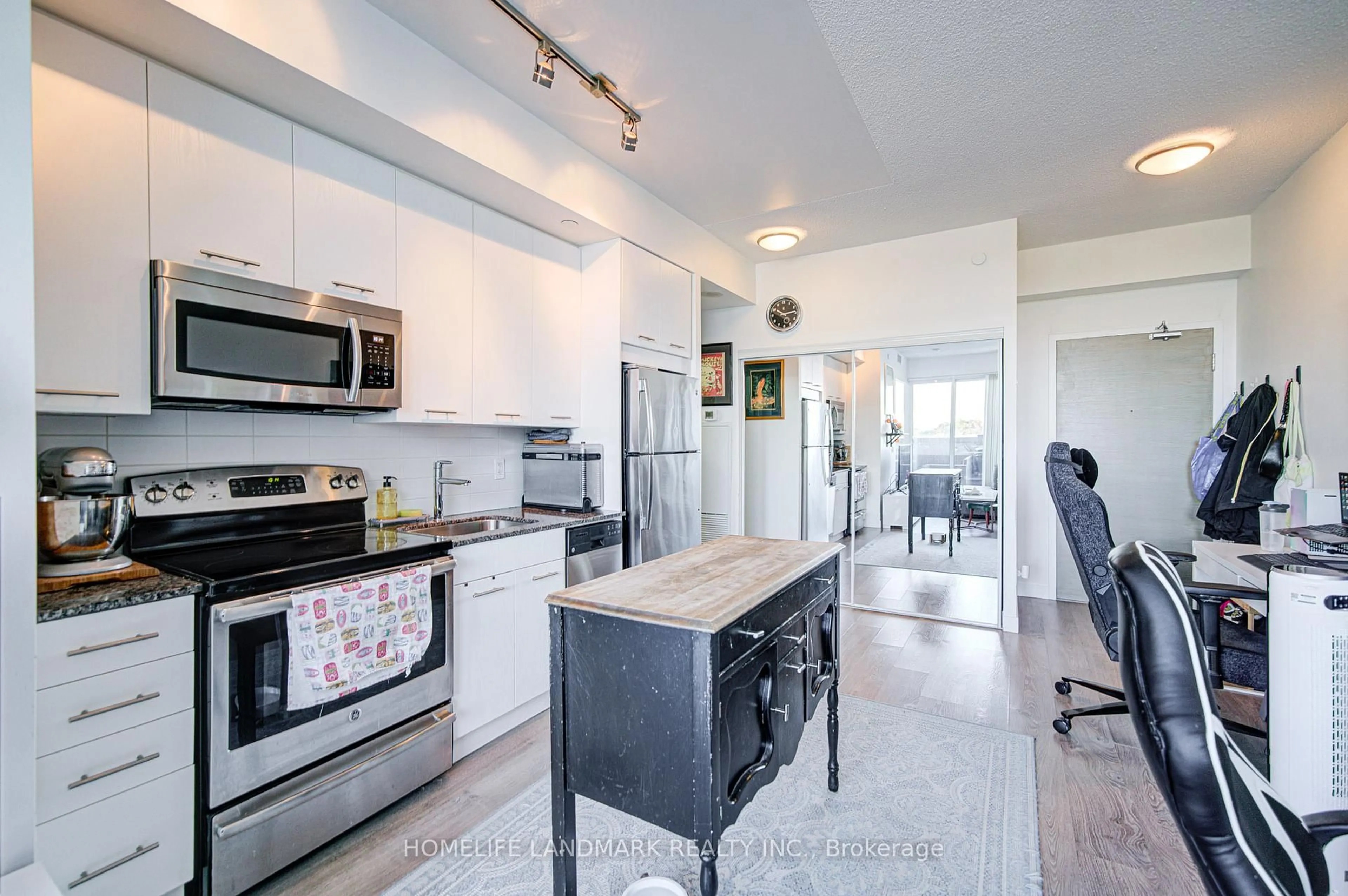 Open concept kitchen, ceramic/tile floor for 2055 Danforth Ave #505, Toronto Ontario M4C 1J8