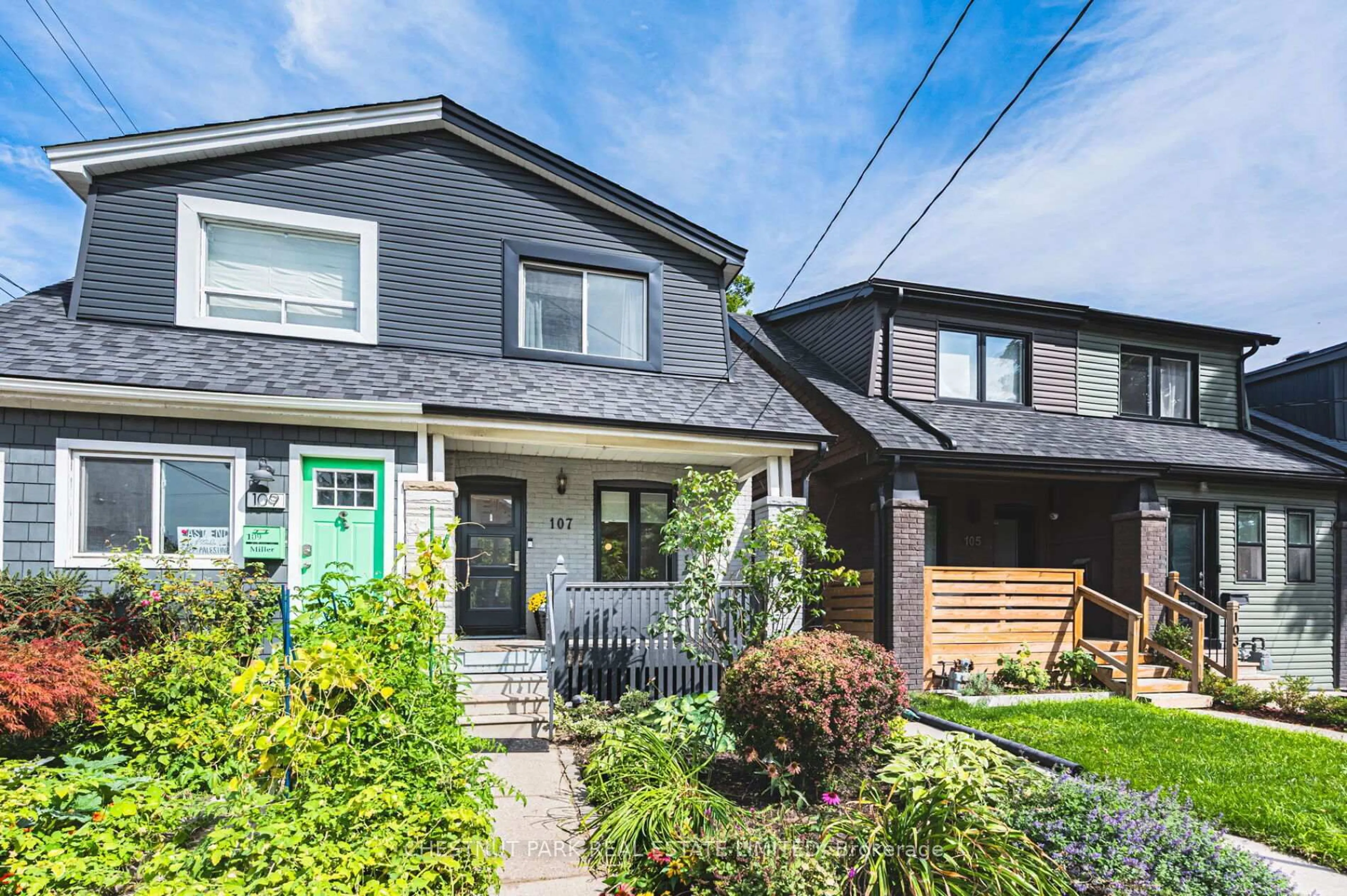 Home with vinyl exterior material, street for 107 Kent Rd, Toronto Ontario M4L 2X5