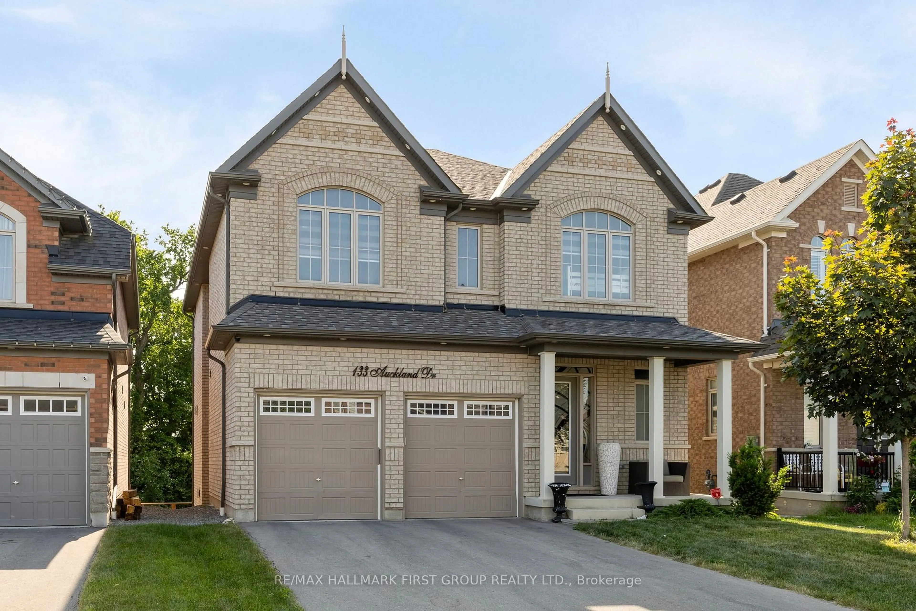 Home with brick exterior material, street for 133 Auckland Dr, Whitby Ontario L1P 0J4