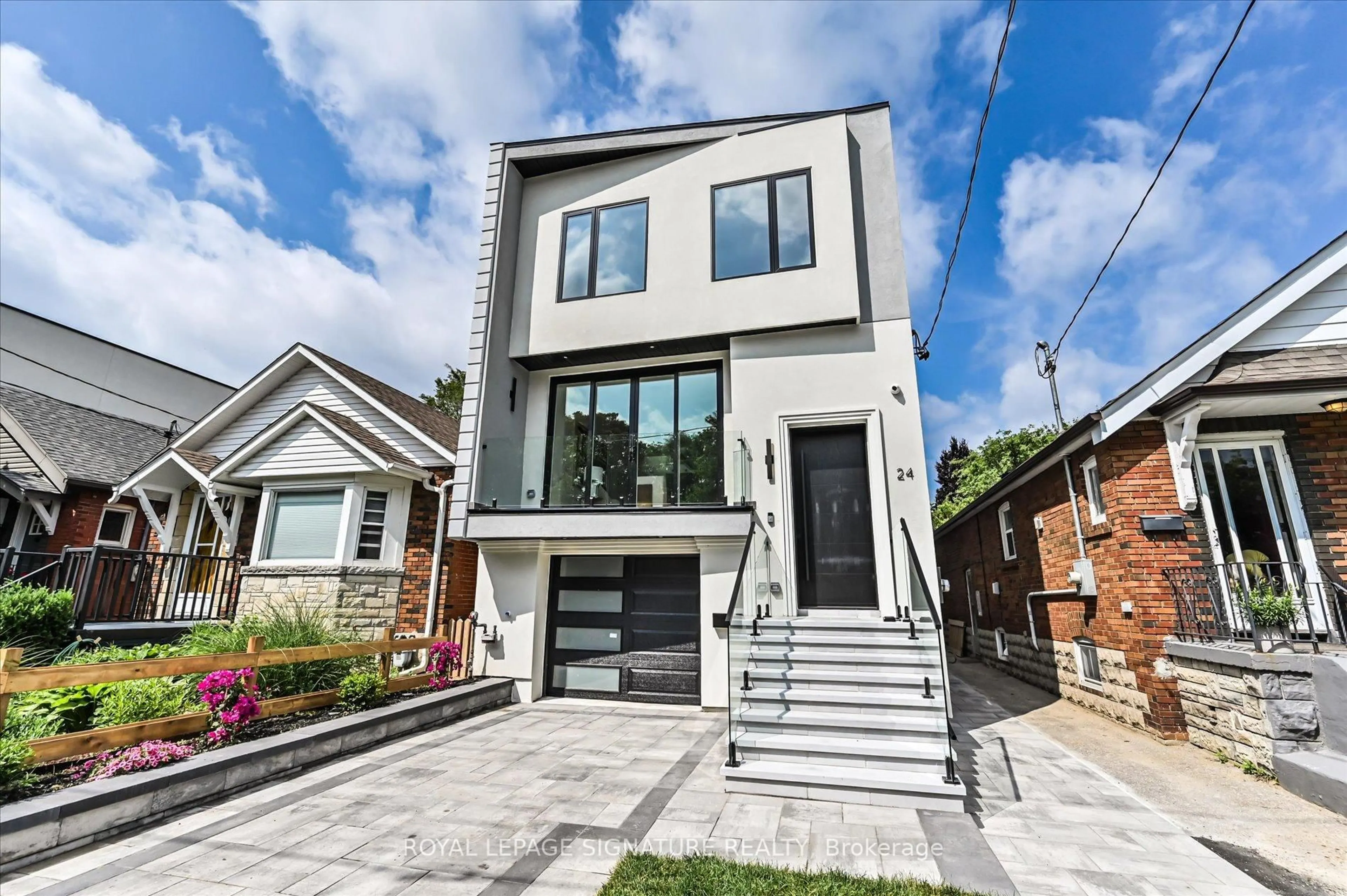 Home with brick exterior material, street for 24 Elmsdale Rd, Toronto Ontario M4J 3M4