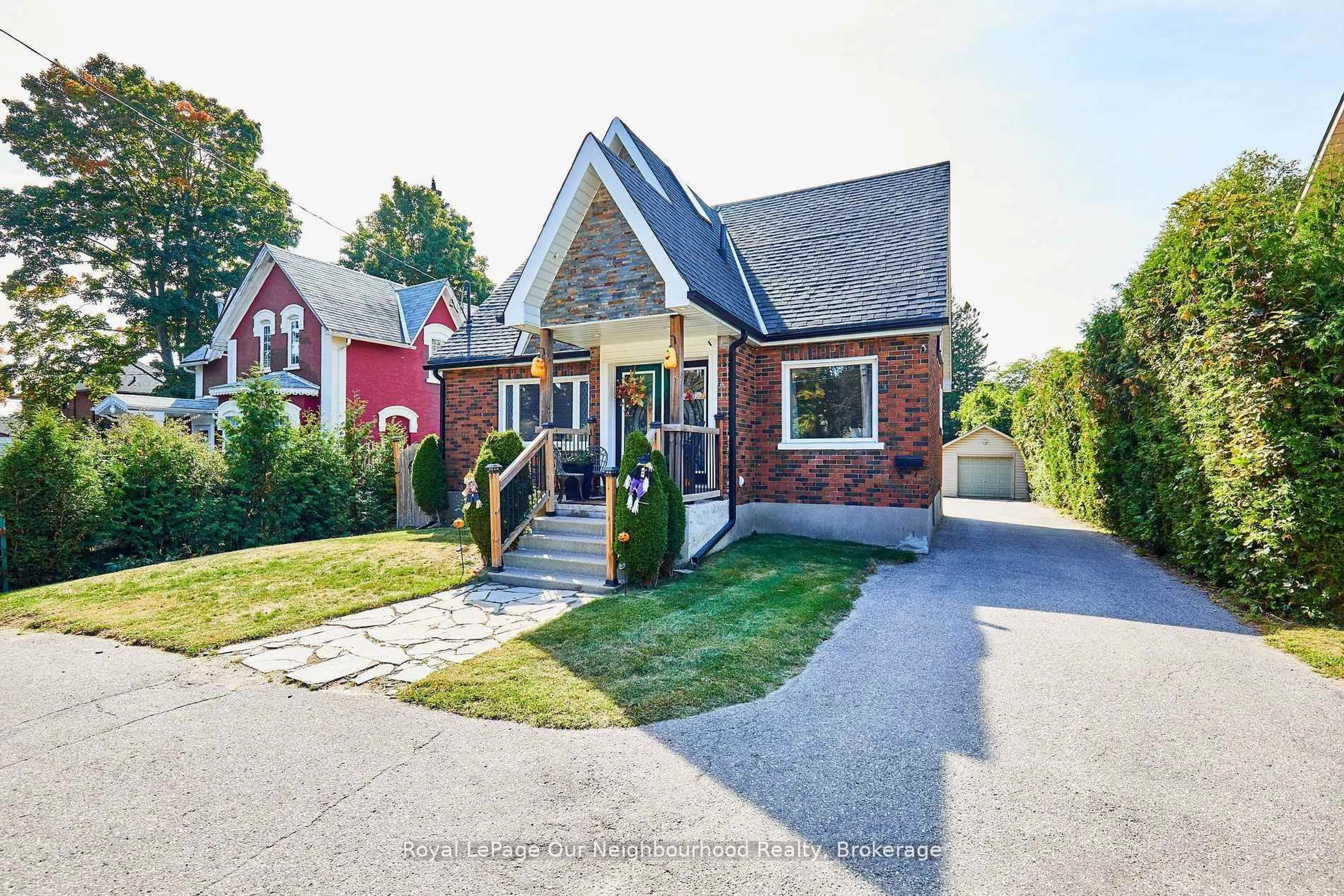 Home with brick exterior material, street for 738 Simcoe St, Oshawa Ontario L1G 4V8