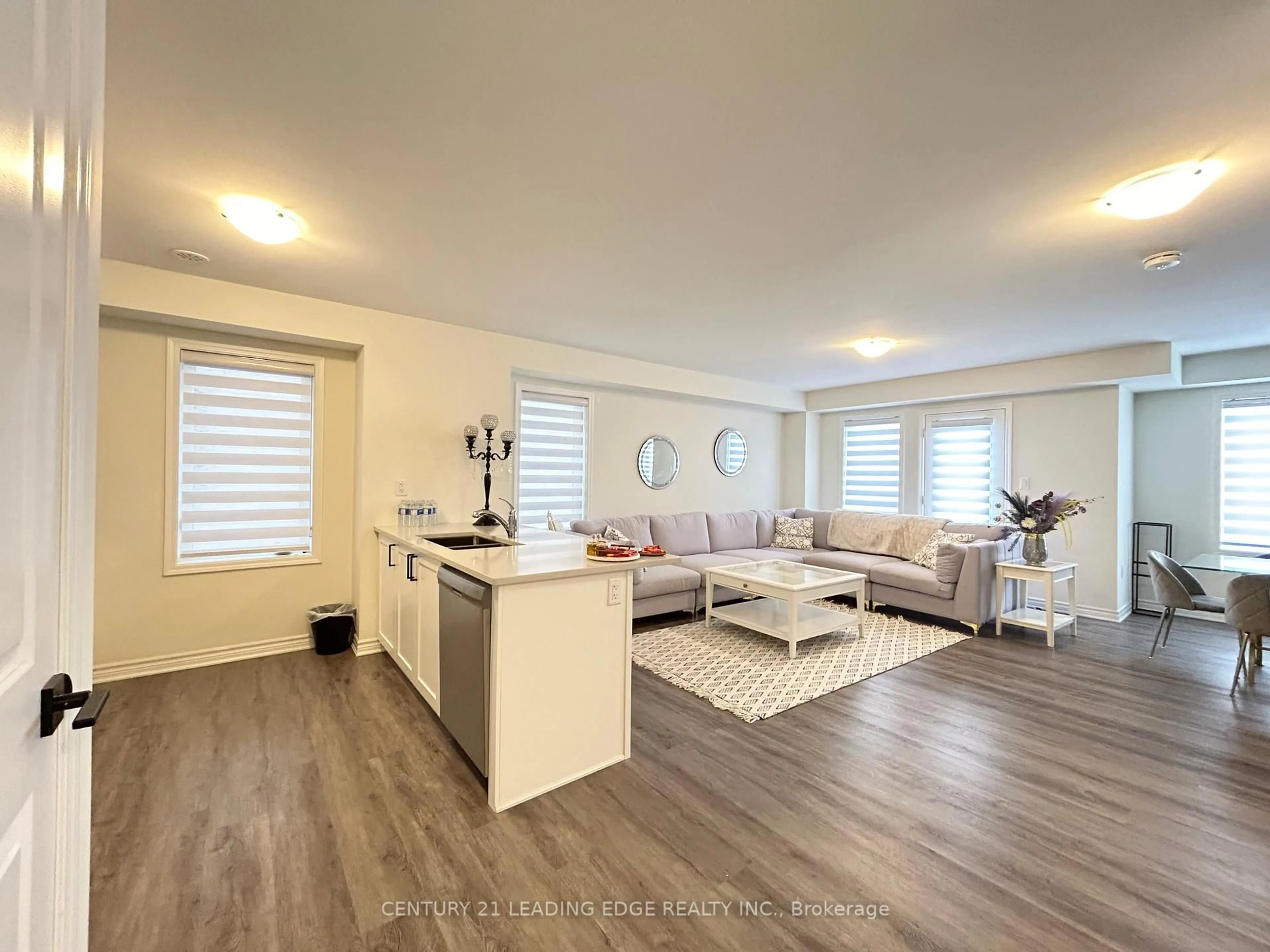 Living room with furniture, wood/laminate floor for 3378 Swordbill St, Pickering Ontario L0H 1J0