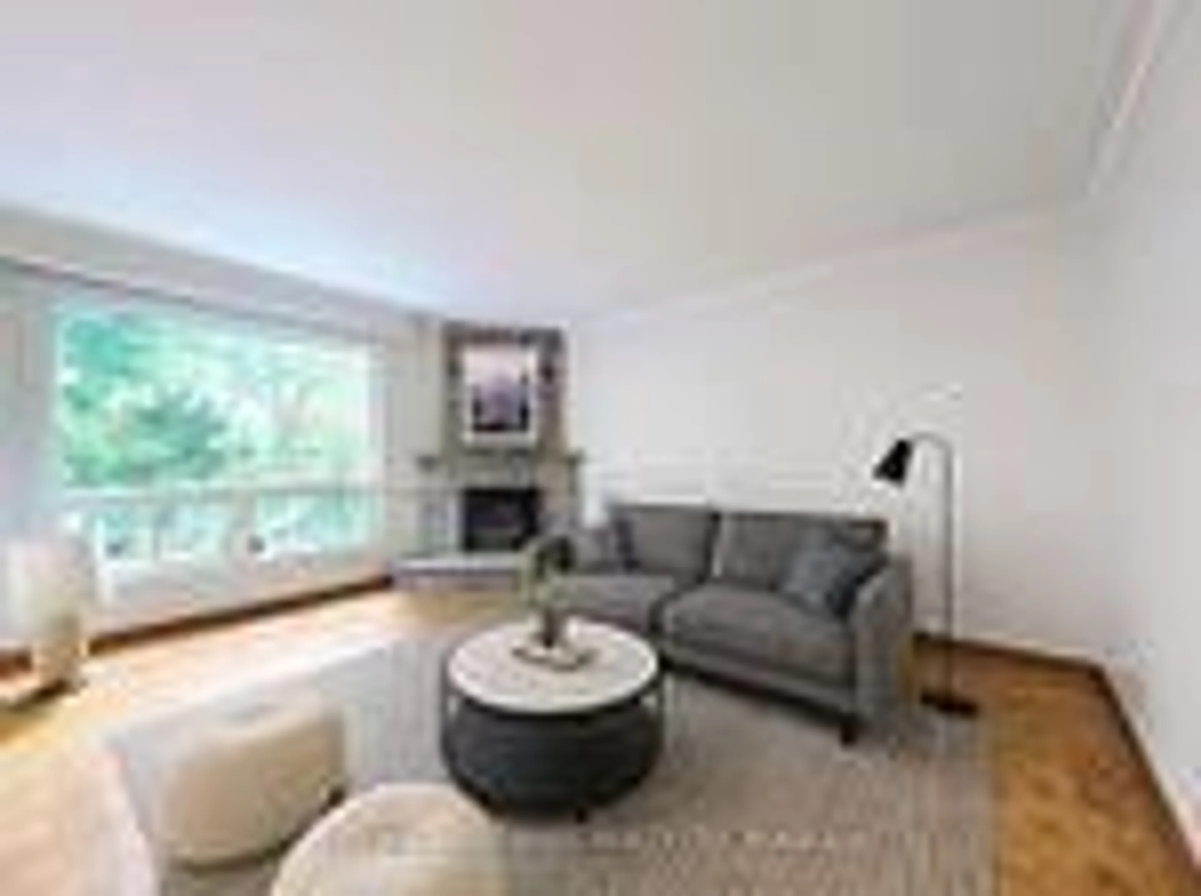 Living room with furniture, wood/laminate floor for 9 Comrie Terr, Toronto Ontario M1M 3T1