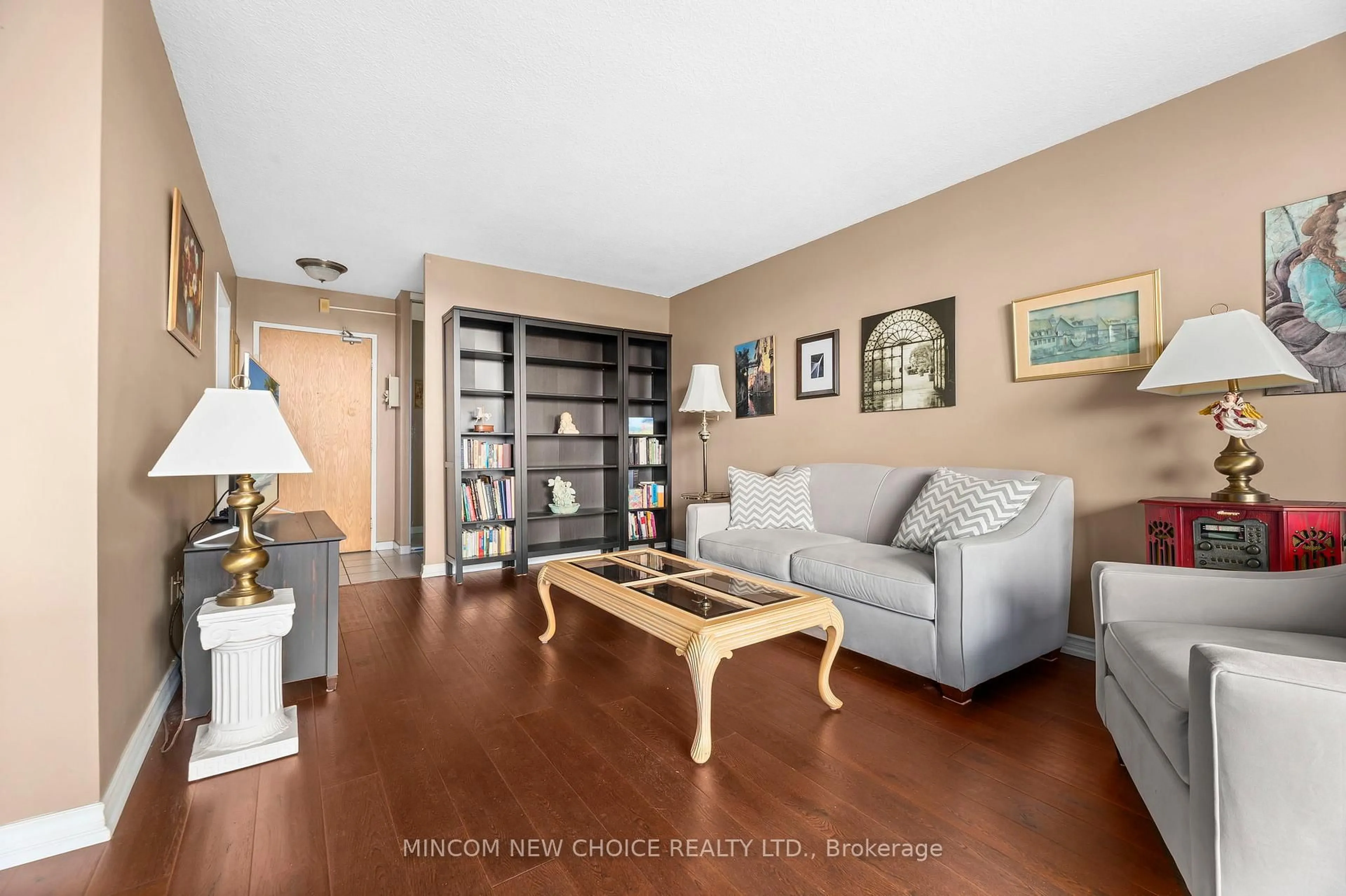 Living room with furniture, wood/laminate floor for 92 Church St #411, Ajax Ontario L1S 6B4