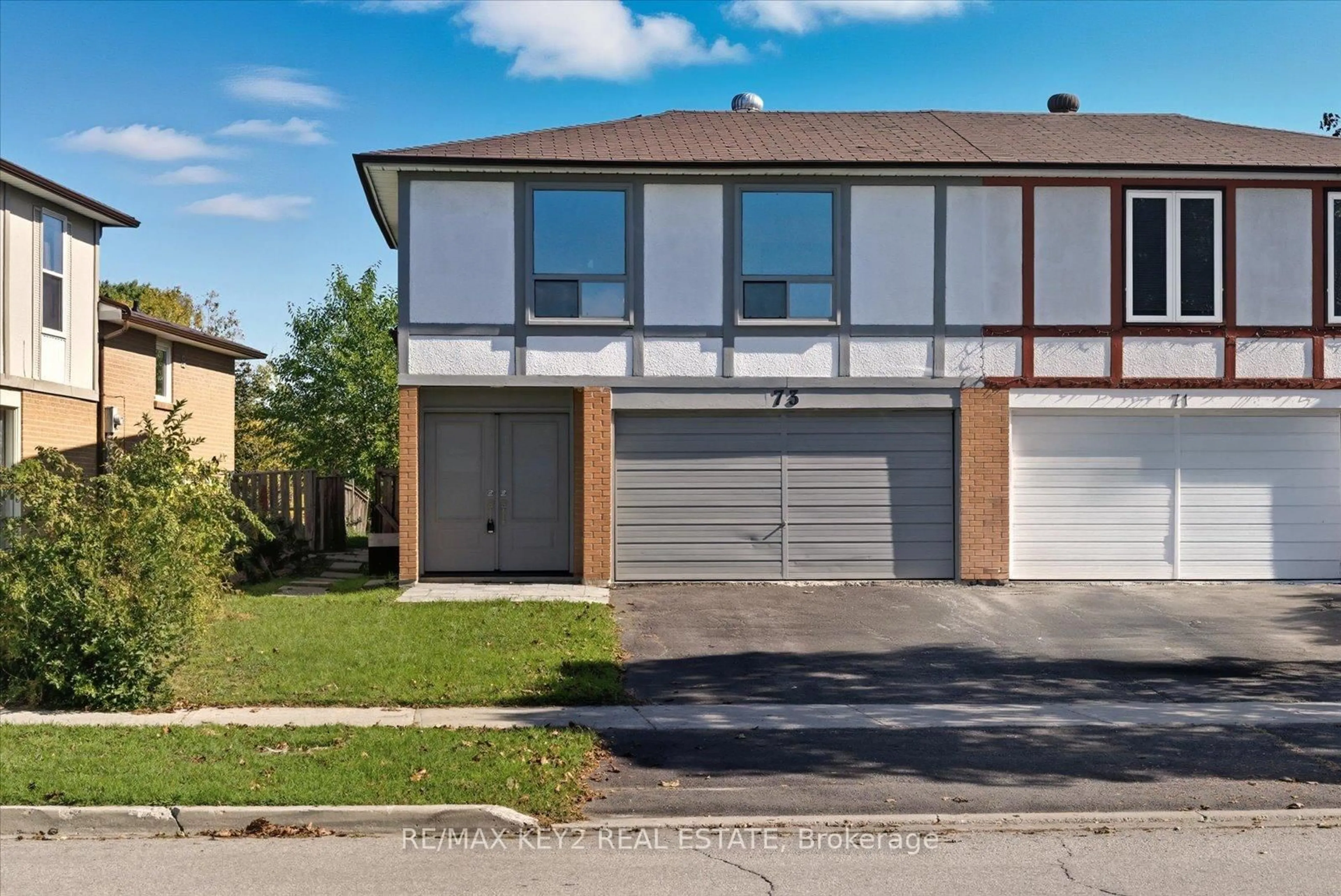 Home with brick exterior material, street for 73 Glen Springs Dr, Toronto Ontario M1W 1X7