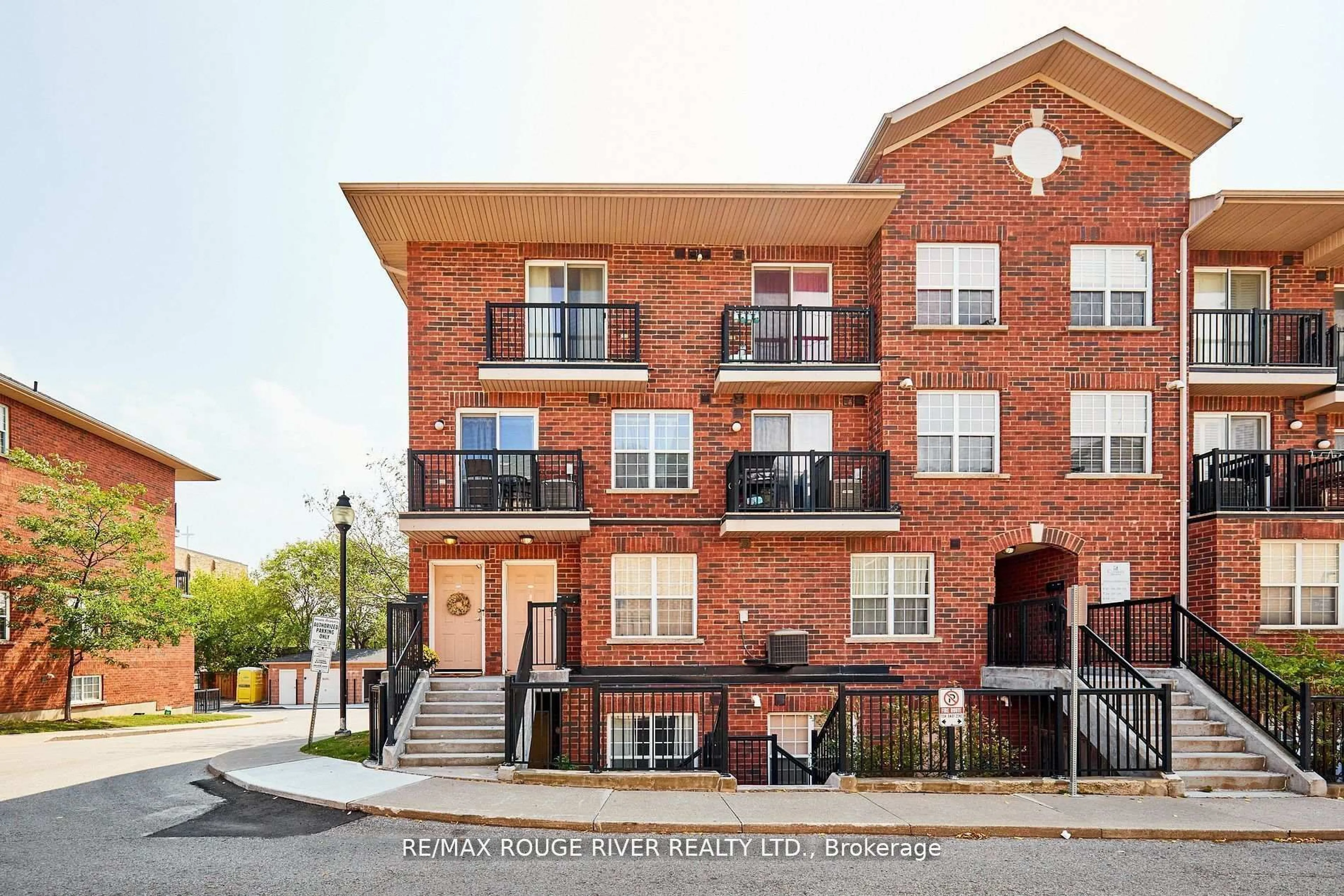 Home with brick exterior material, street for 25 Strangford Lane #312, Toronto Ontario M1L 0E4