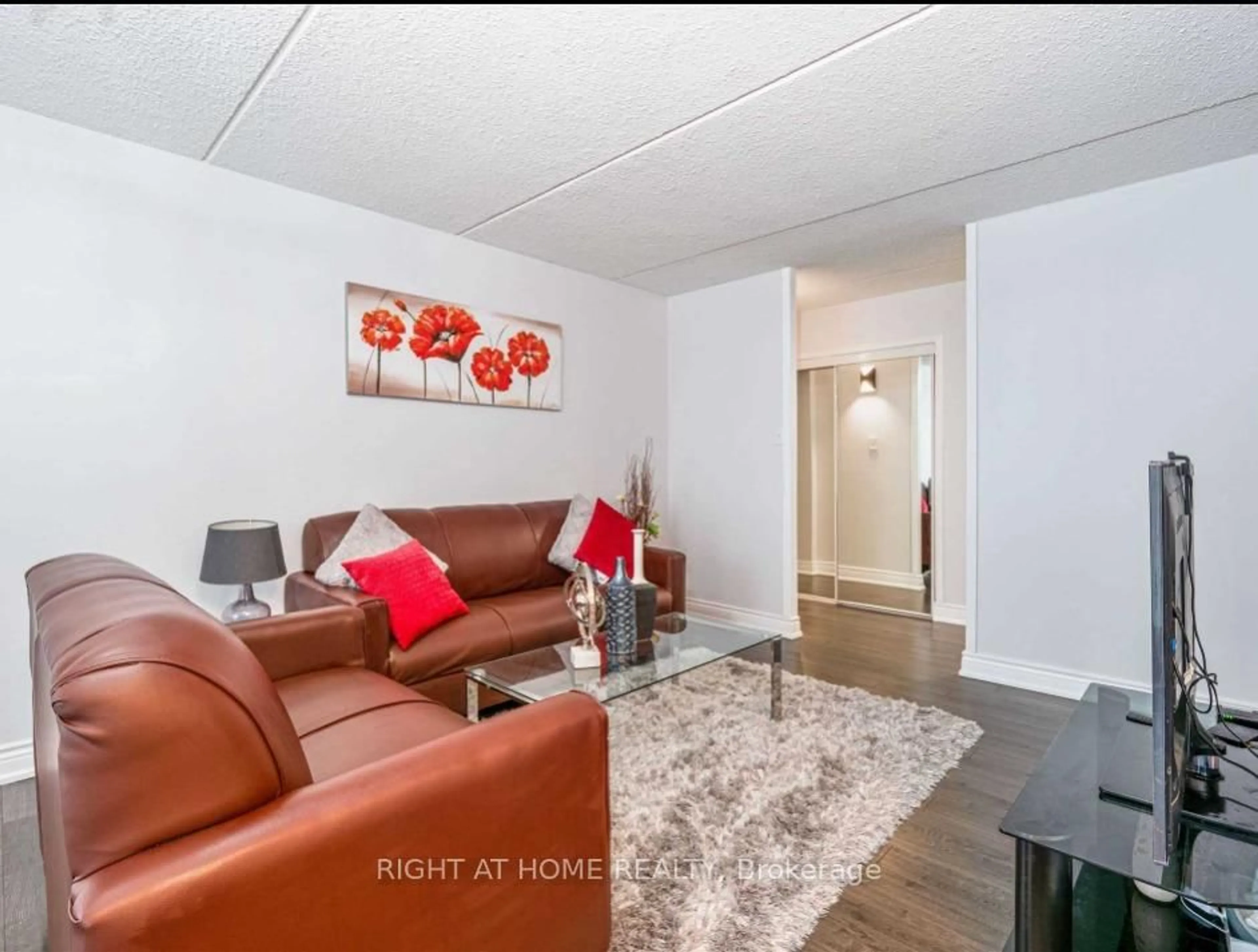 Living room with furniture, unknown for 2 Glamorgan Ave #1104, Toronto Ontario M1P 2M8