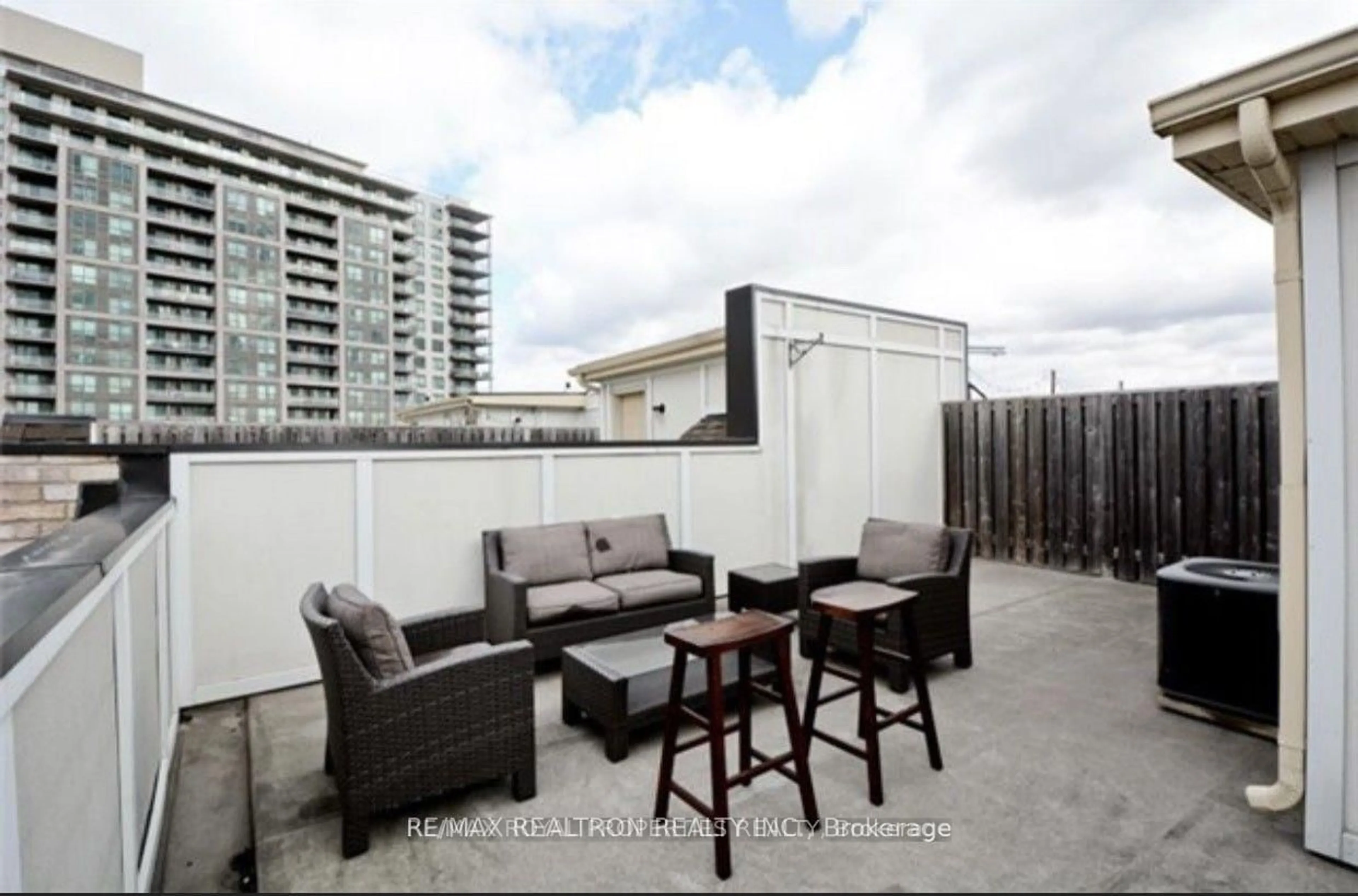 Patio, city buildings view from balcony for 1250 St. Martins Dr #92, Pickering Ontario L1W 0A2