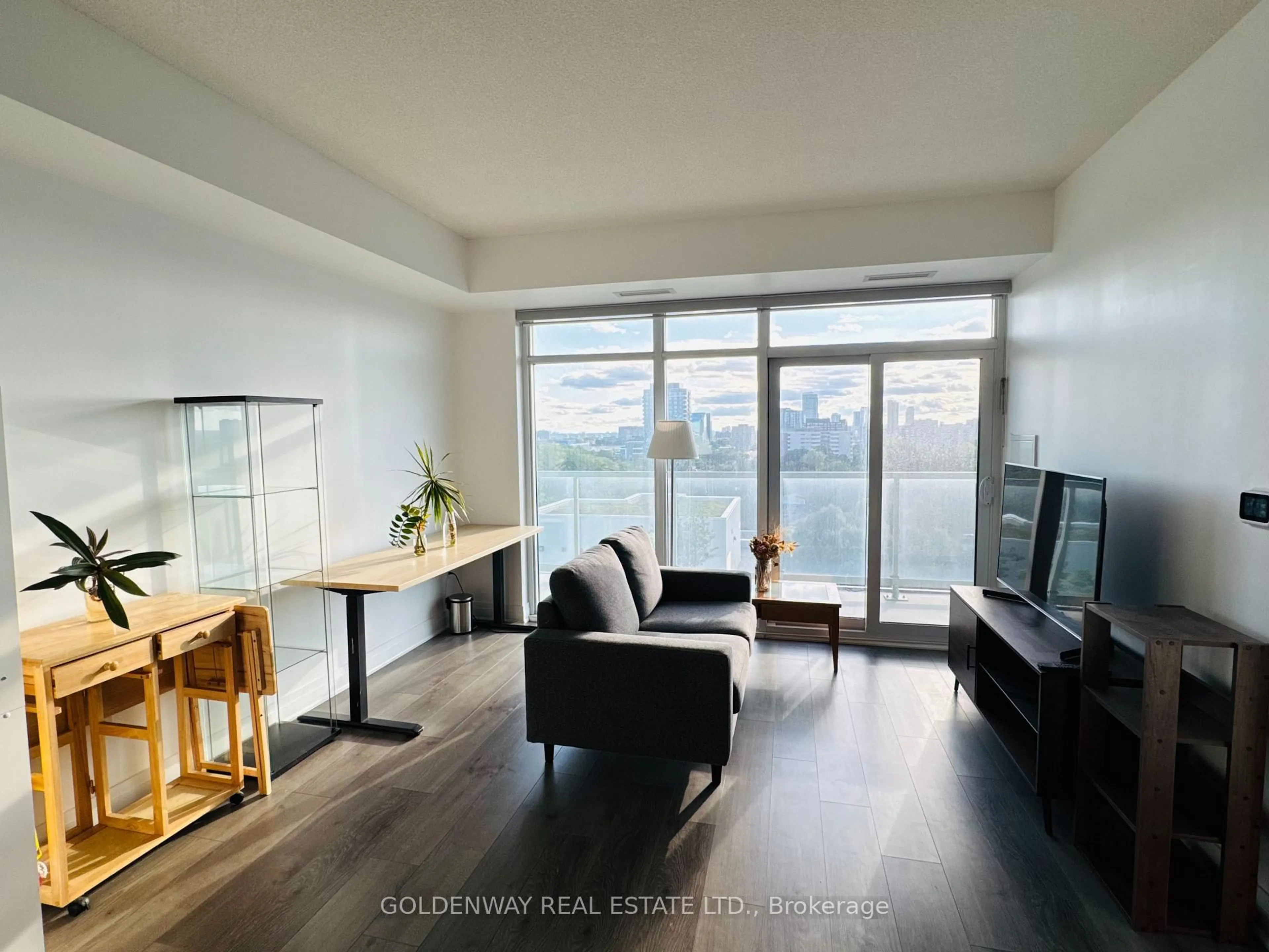 Living room with furniture, wood/laminate floor for 3220 Sheppard Ave #901, Toronto Ontario M1T 3K1