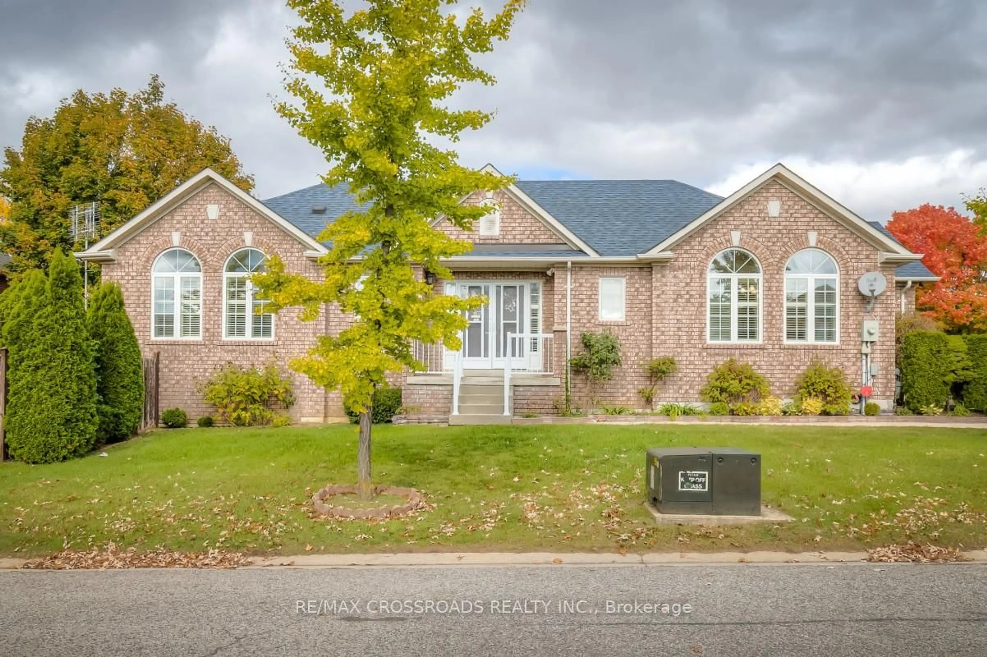 Home with brick exterior material, street for 26 Lurosa Cres, Whitby Ontario L1R 3A9