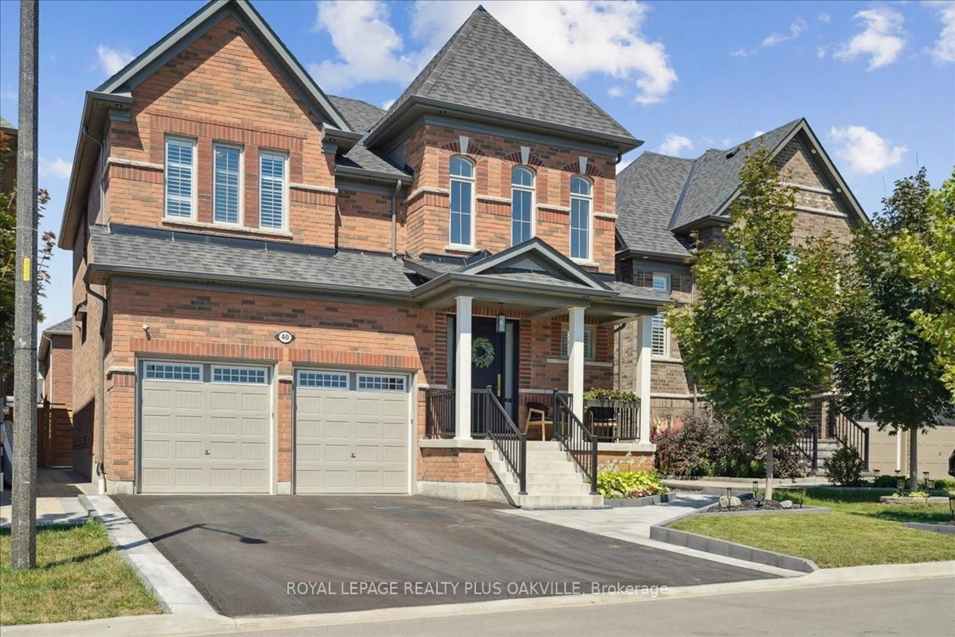 Home with brick exterior material, street for 40 Soltys Dr, Whitby Ontario L1P 0J4