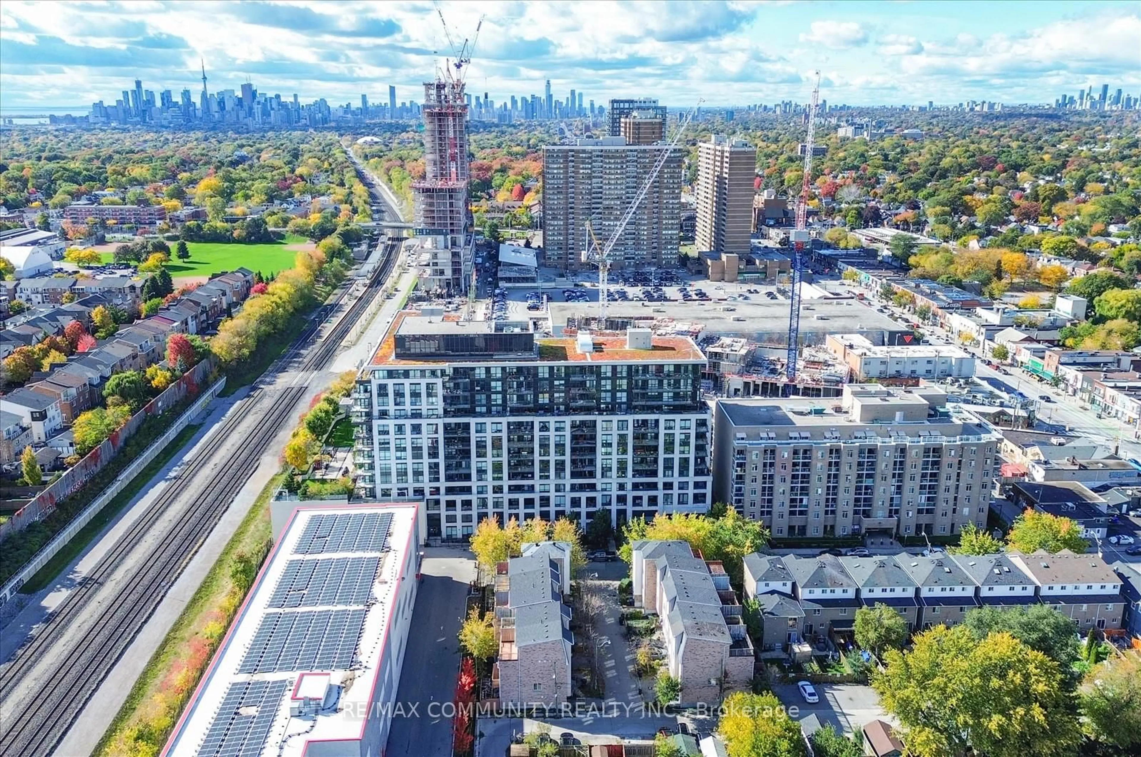 A pic from outside/outdoor area/front of a property/back of a property/a pic from drone, city buildings view from balcony for 8 Trent Ave #414, Toronto Ontario M4C 0A6