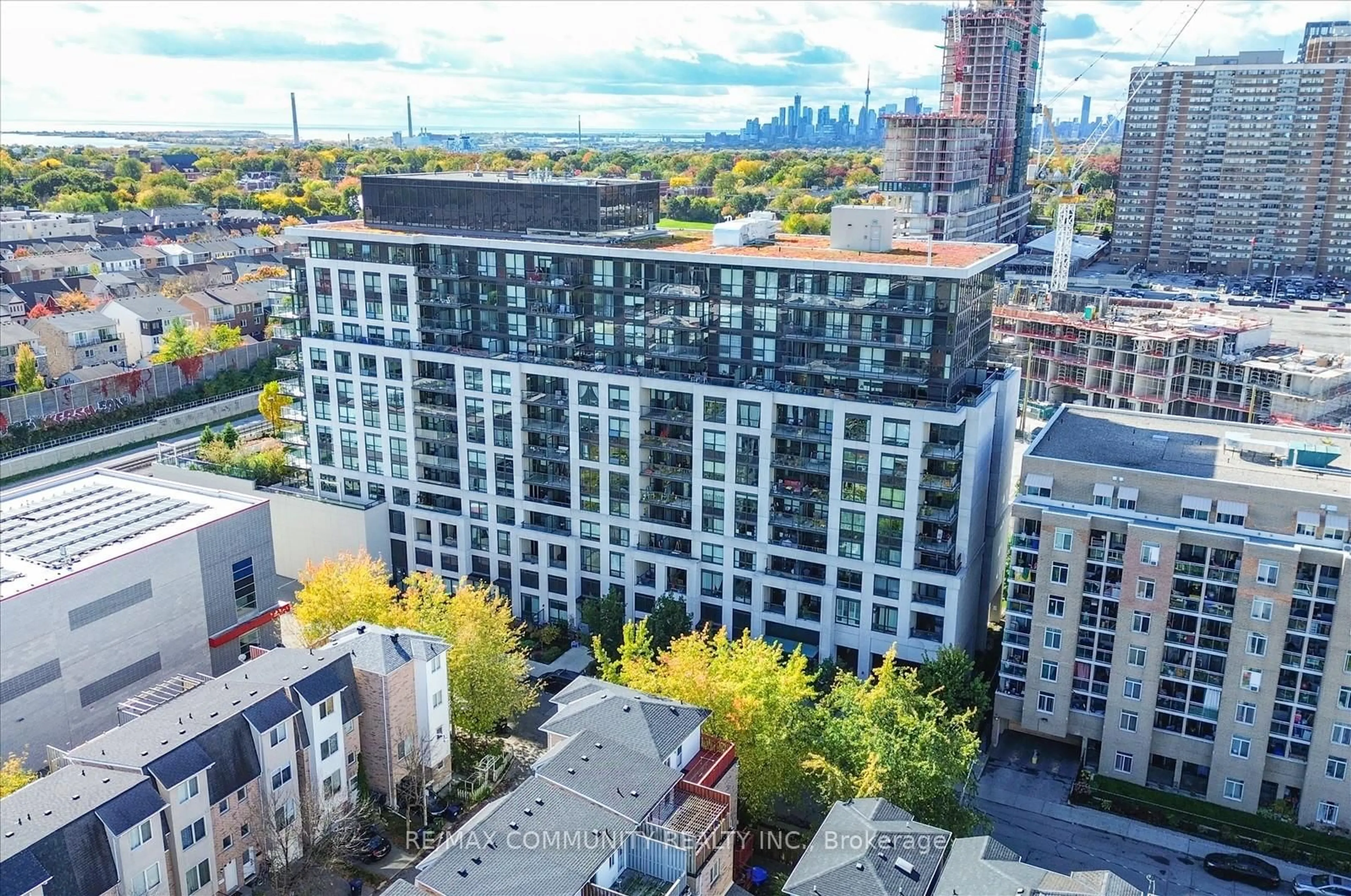 A pic from outside/outdoor area/front of a property/back of a property/a pic from drone, city buildings view from balcony for 8 Trent Ave #414, Toronto Ontario M4C 0A6