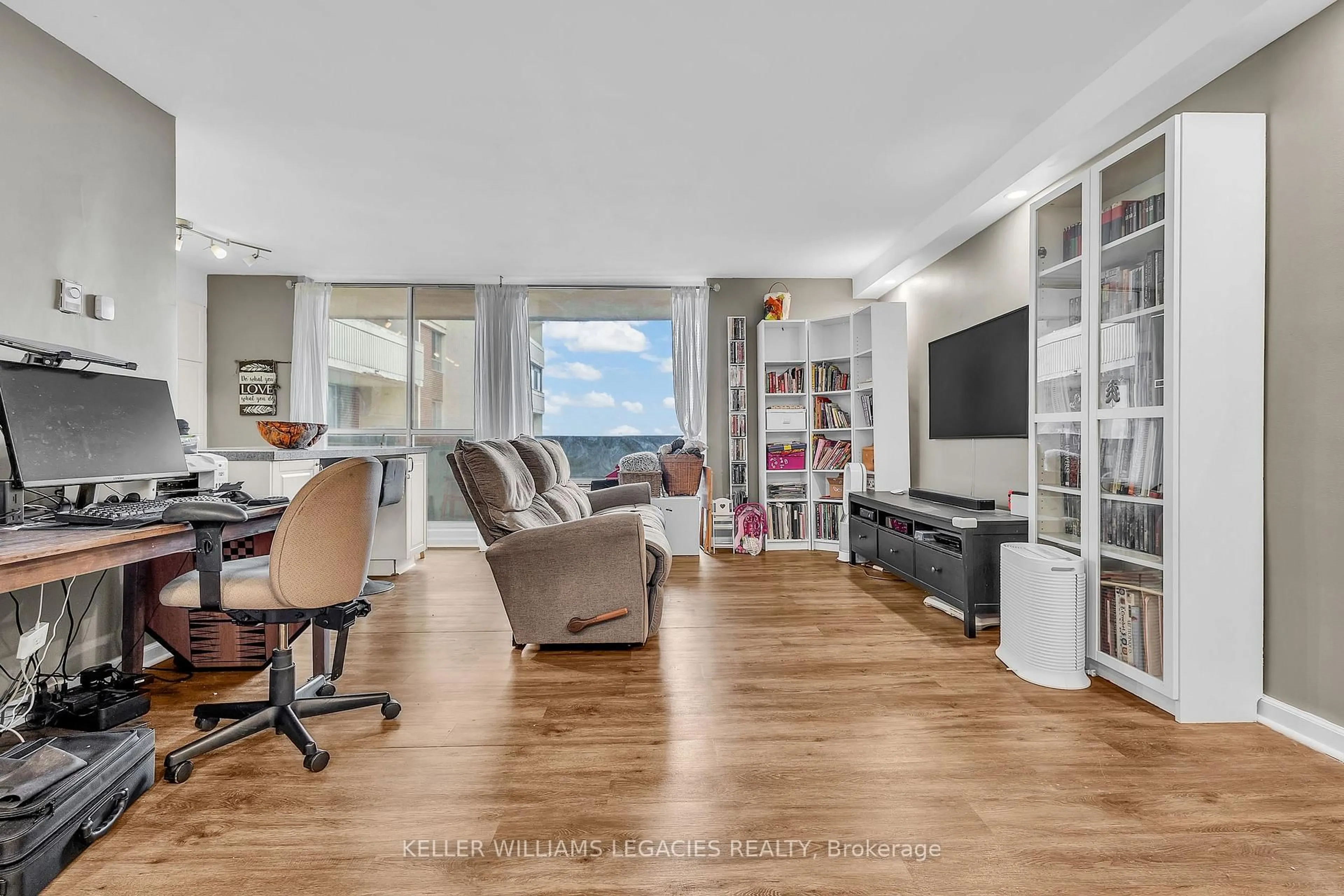 Living room with furniture, unknown for 1 Massey Sq #2001, Toronto Ontario M4C 5L4