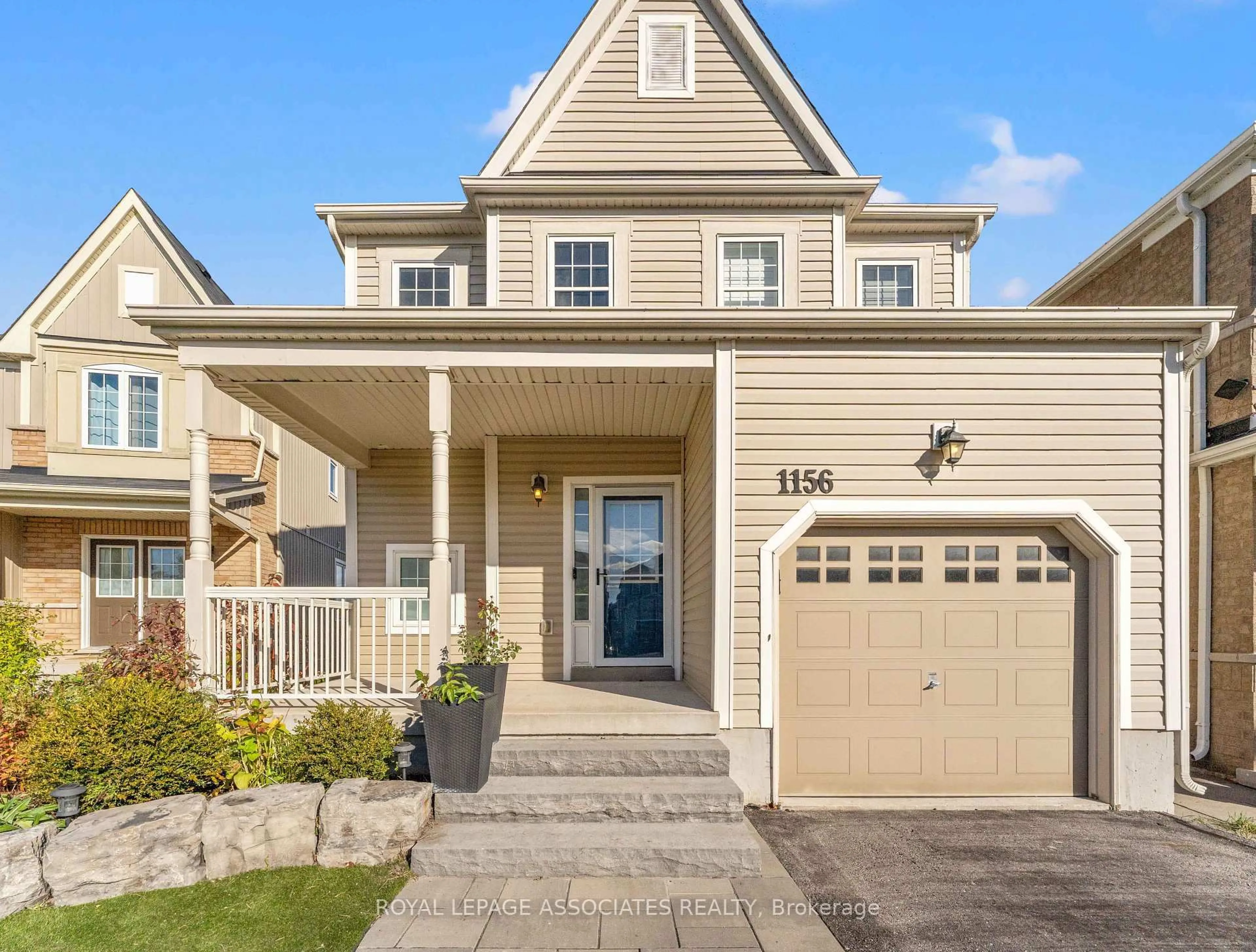 Home with vinyl exterior material, street for 1165 Edward Bolton Cres, Oshawa Ontario L1K 0T7