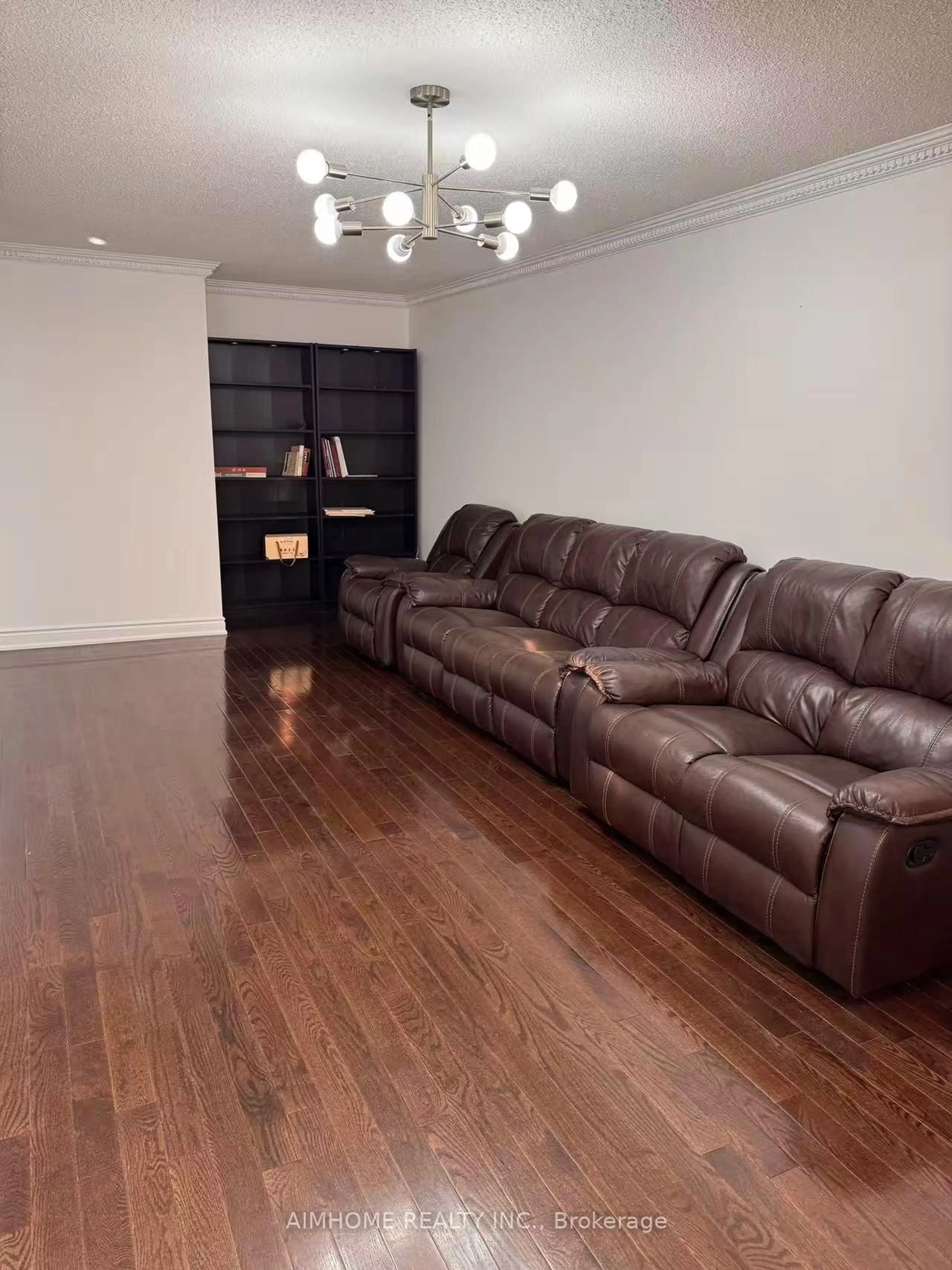 Living room with furniture, wood/laminate floor for 213 Hupfield Tr, Toronto Ontario M1B 4L8