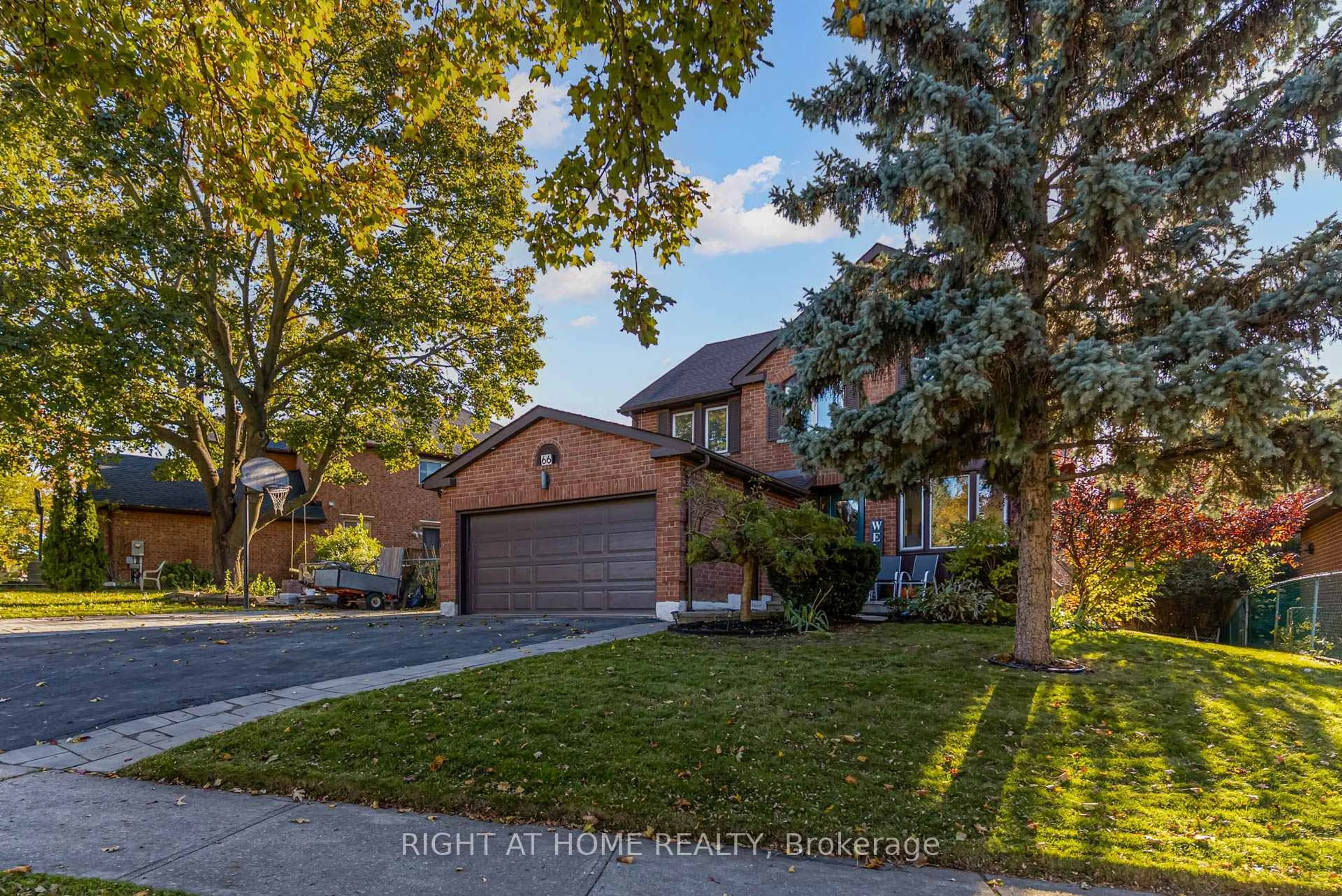 Home with brick exterior material, street for 66 Glen Hill Dr, Whitby Ontario L1N 7A3