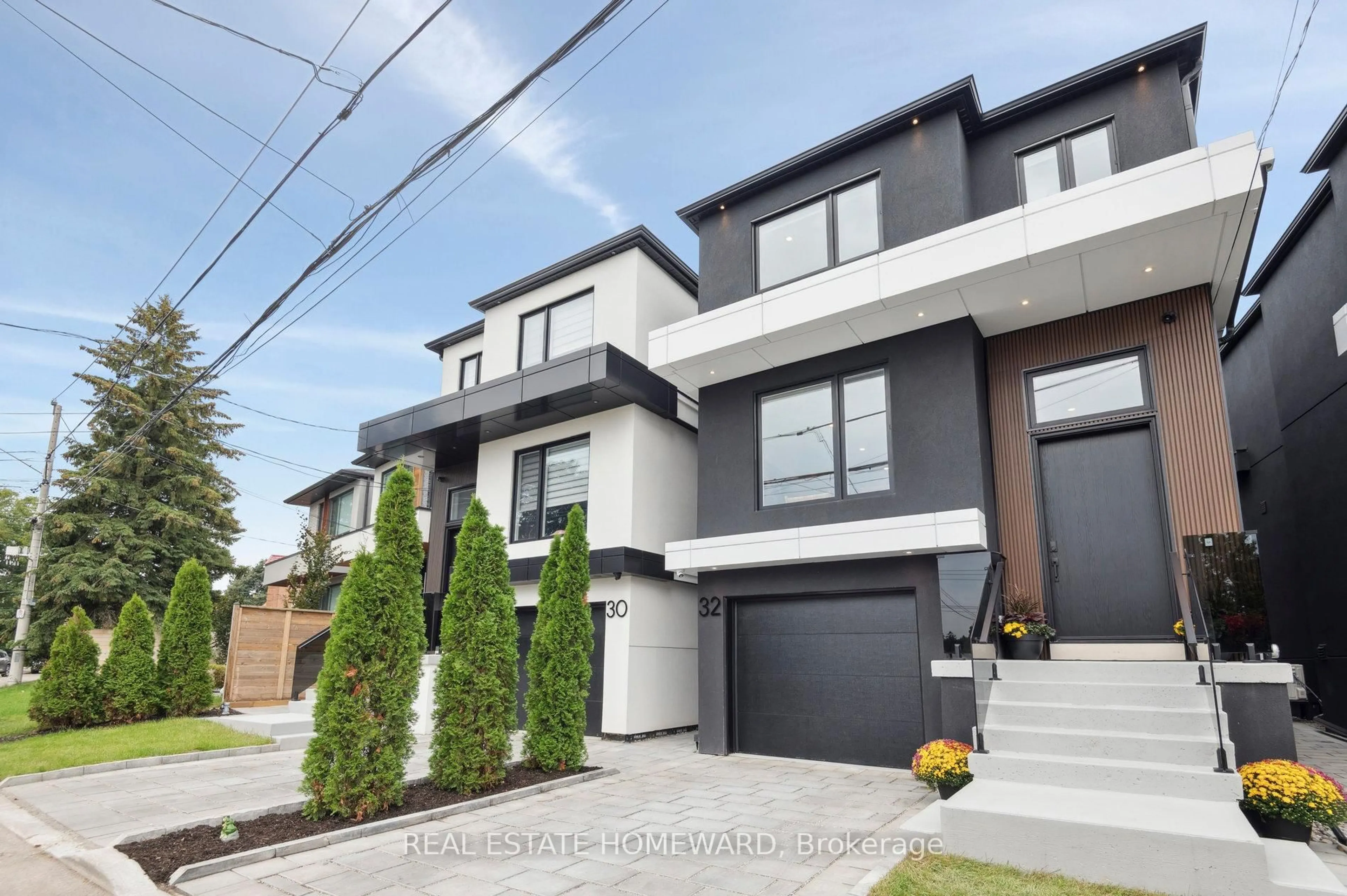 Home with brick exterior material, street for 32 Westlake Cres, Toronto Ontario M4C 2X2