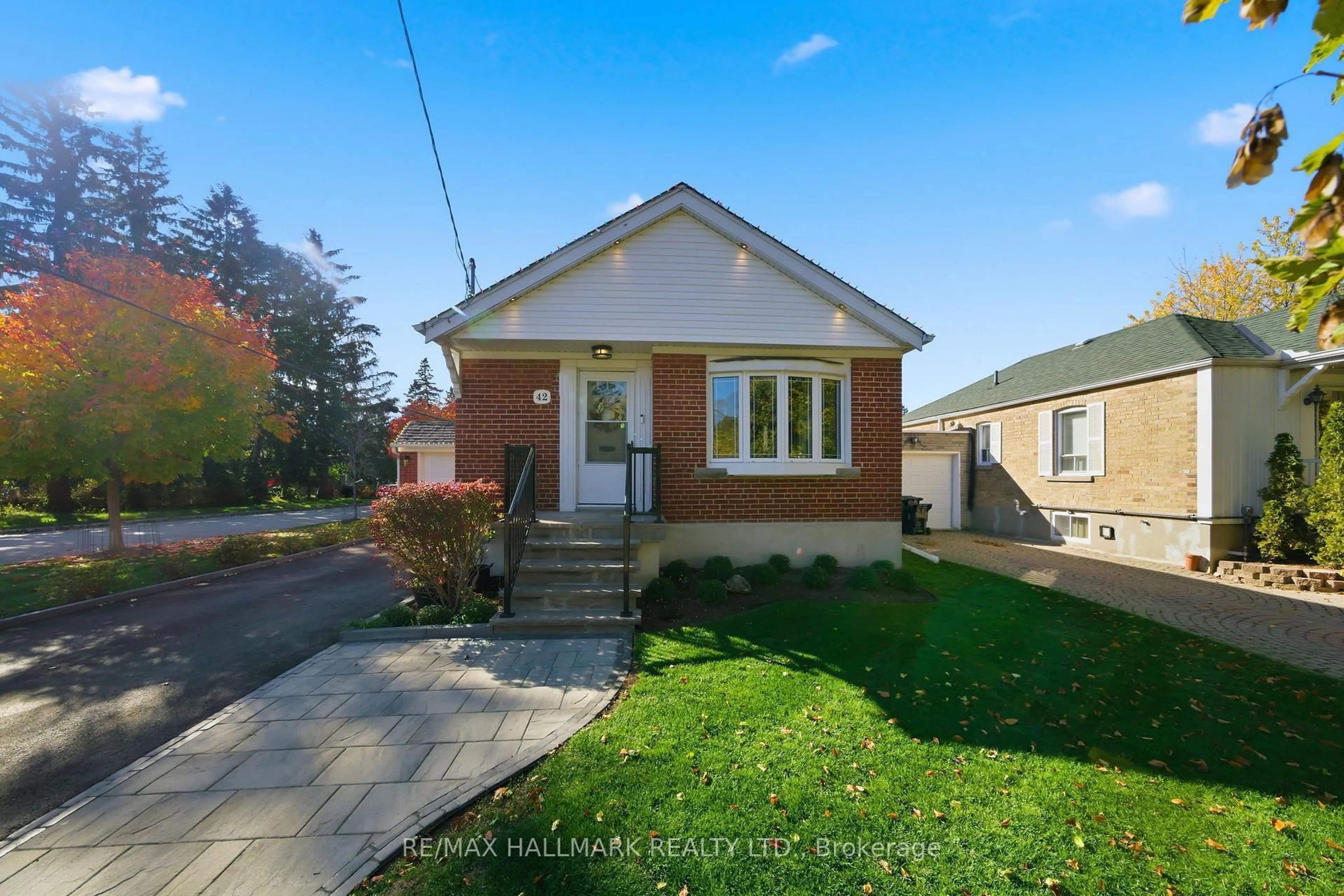 Home with brick exterior material, street for 42 Marsh Rd, Toronto Ontario M1K 1Y9