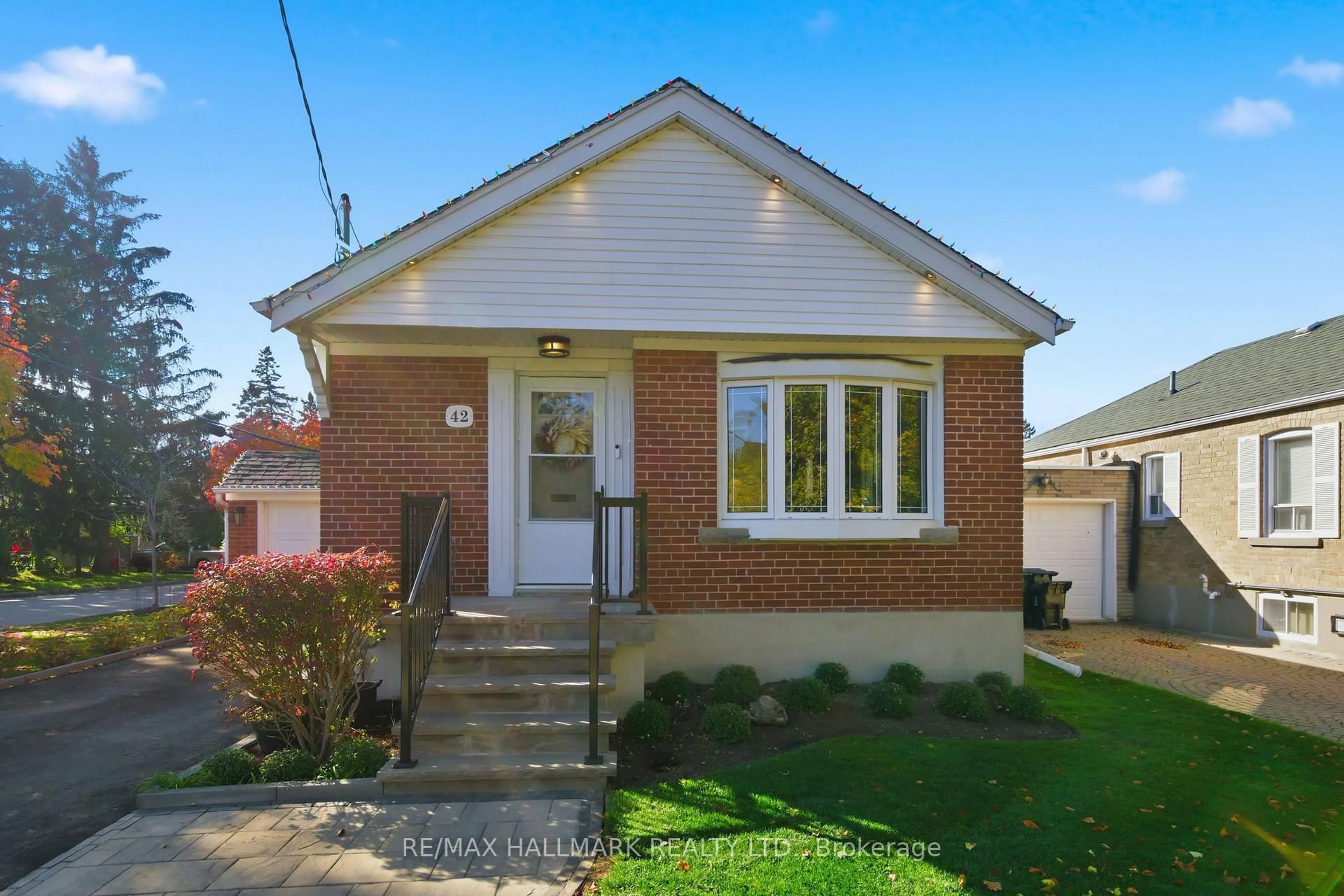 Home with brick exterior material, street for 42 Marsh Rd, Toronto Ontario M1K 1Y9