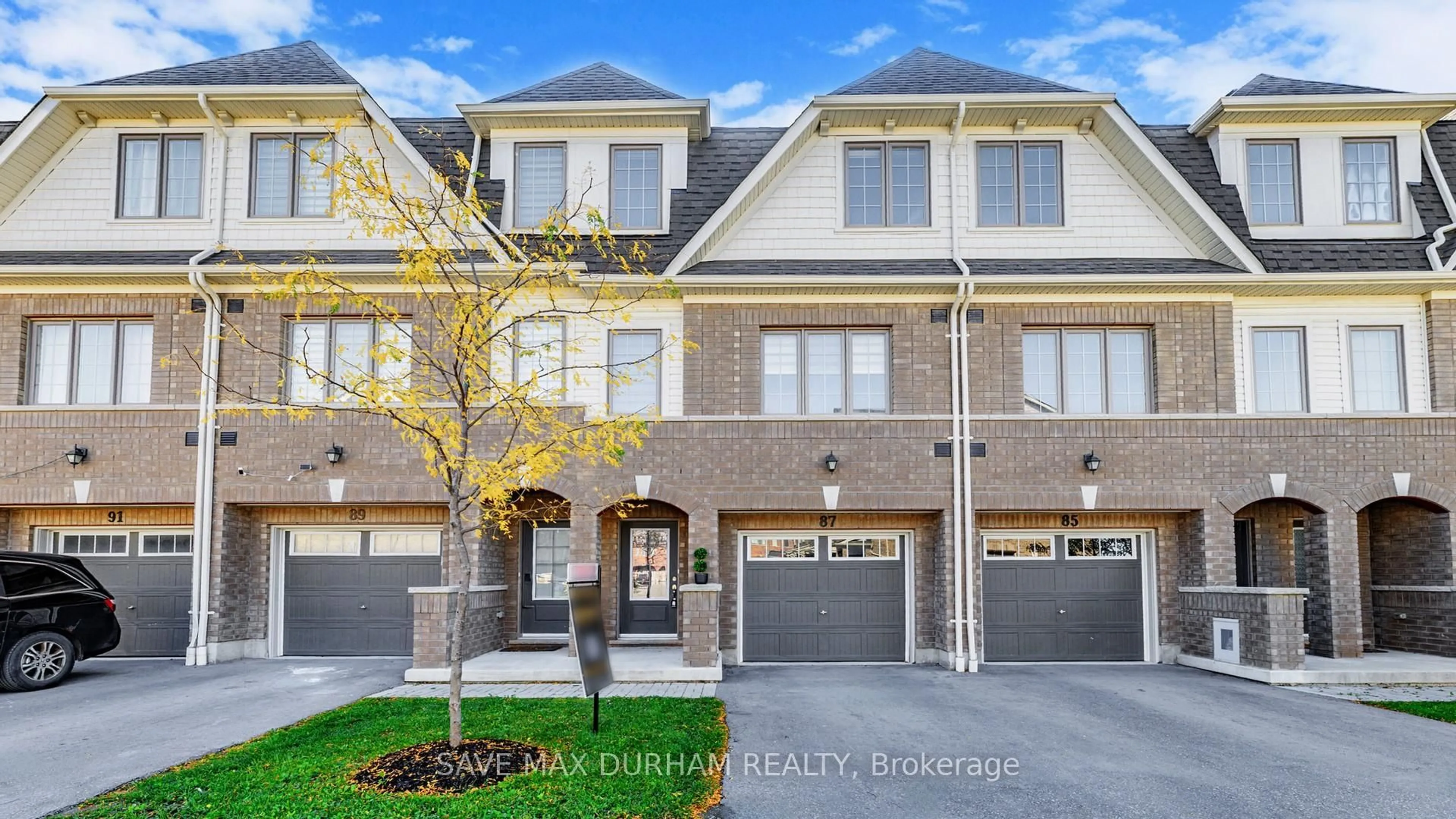 Home with brick exterior material, street for 87 Danzatore Path, Oshawa Ontario L1L 0P9