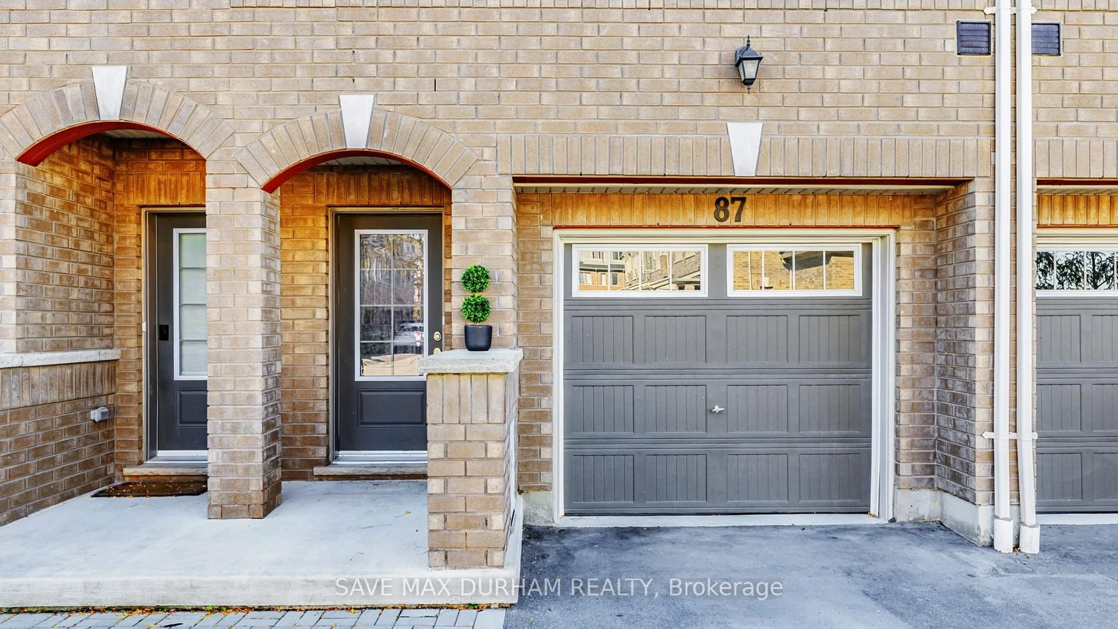 Home with brick exterior material, street for 87 Danzatore Path, Oshawa Ontario L1L 0P9