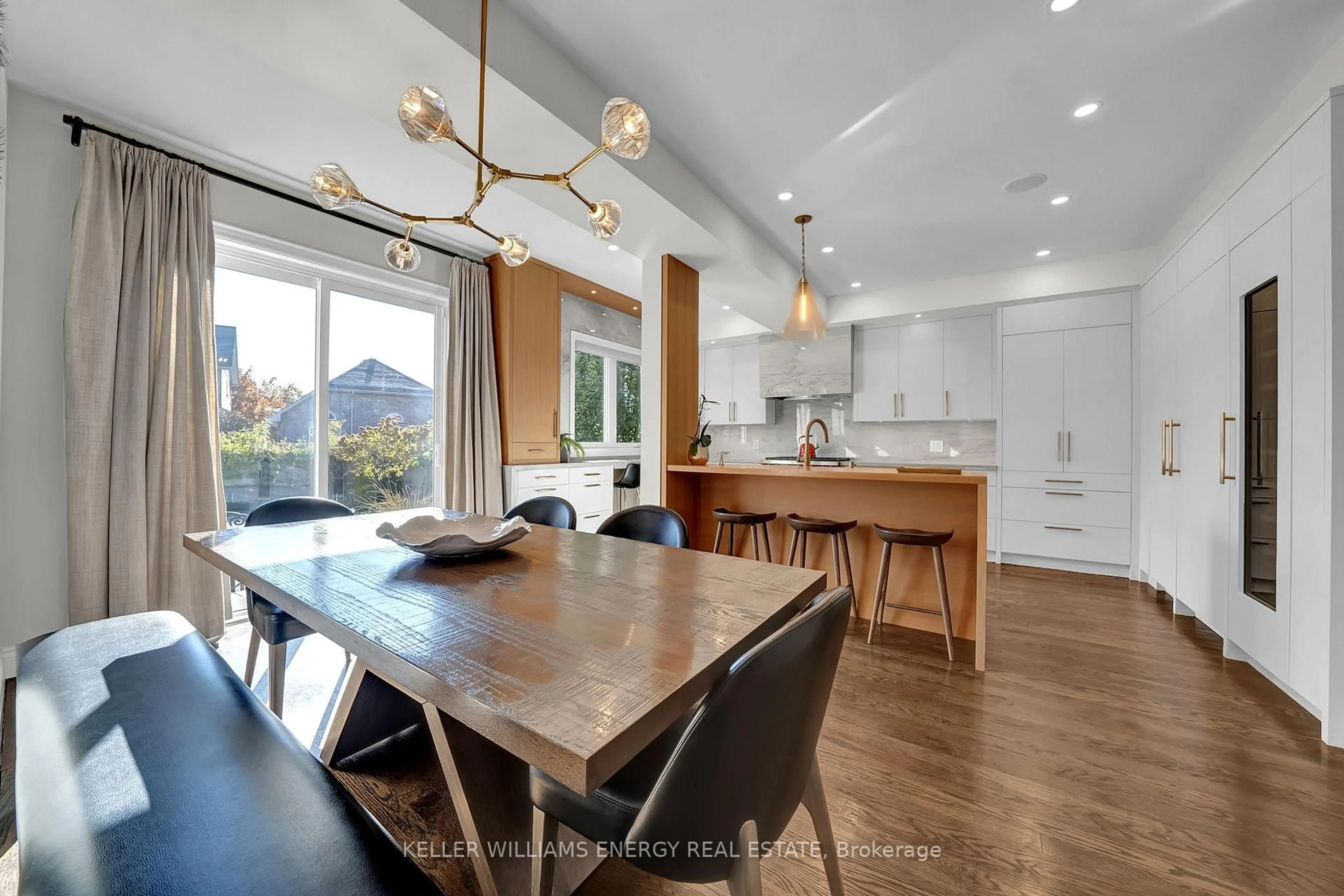 Open concept kitchen, wood/laminate floor for 402 Bovin Ave, Oshawa Ontario L1L 0C6