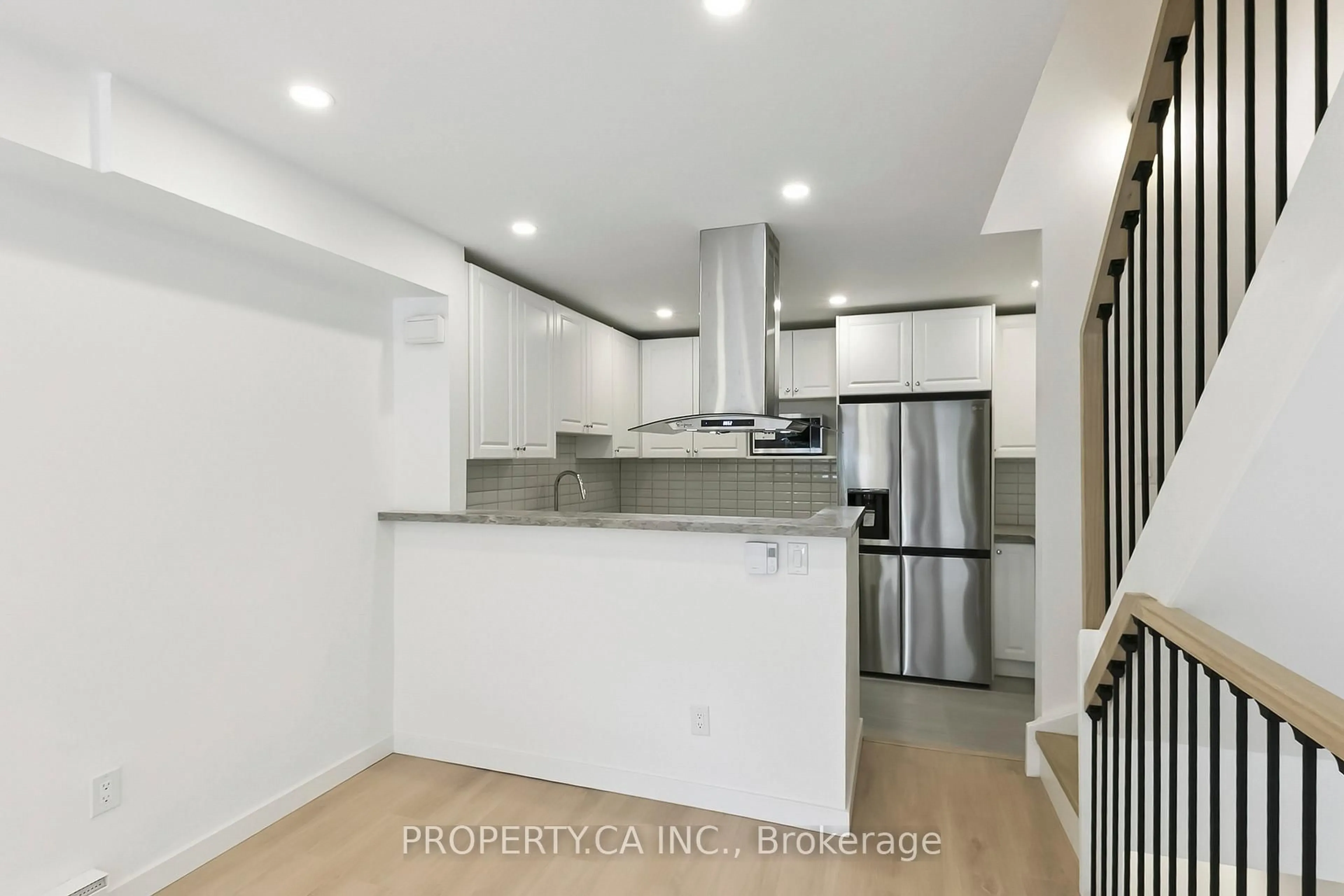 Open concept kitchen, ceramic/tile floor for 1209 Queen St #29, Toronto Ontario M4M 3H4