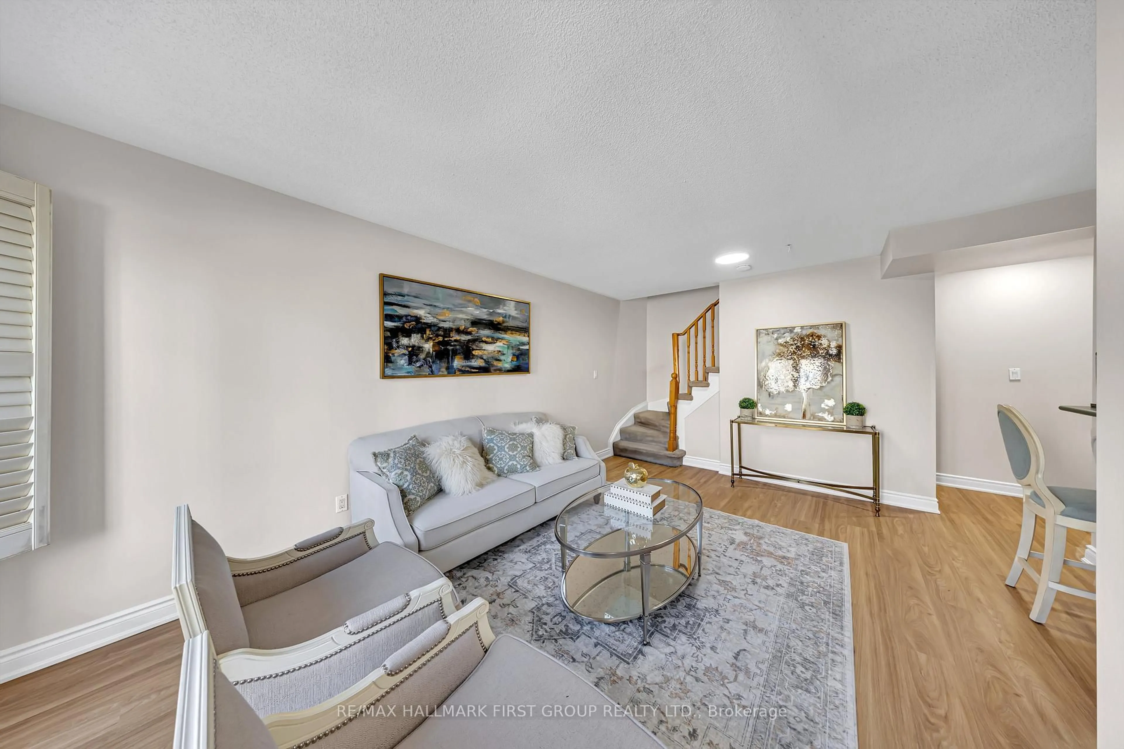 Living room with furniture, unknown for 29 Rosebank Dr #102, Toronto Ontario M1B 5Y7