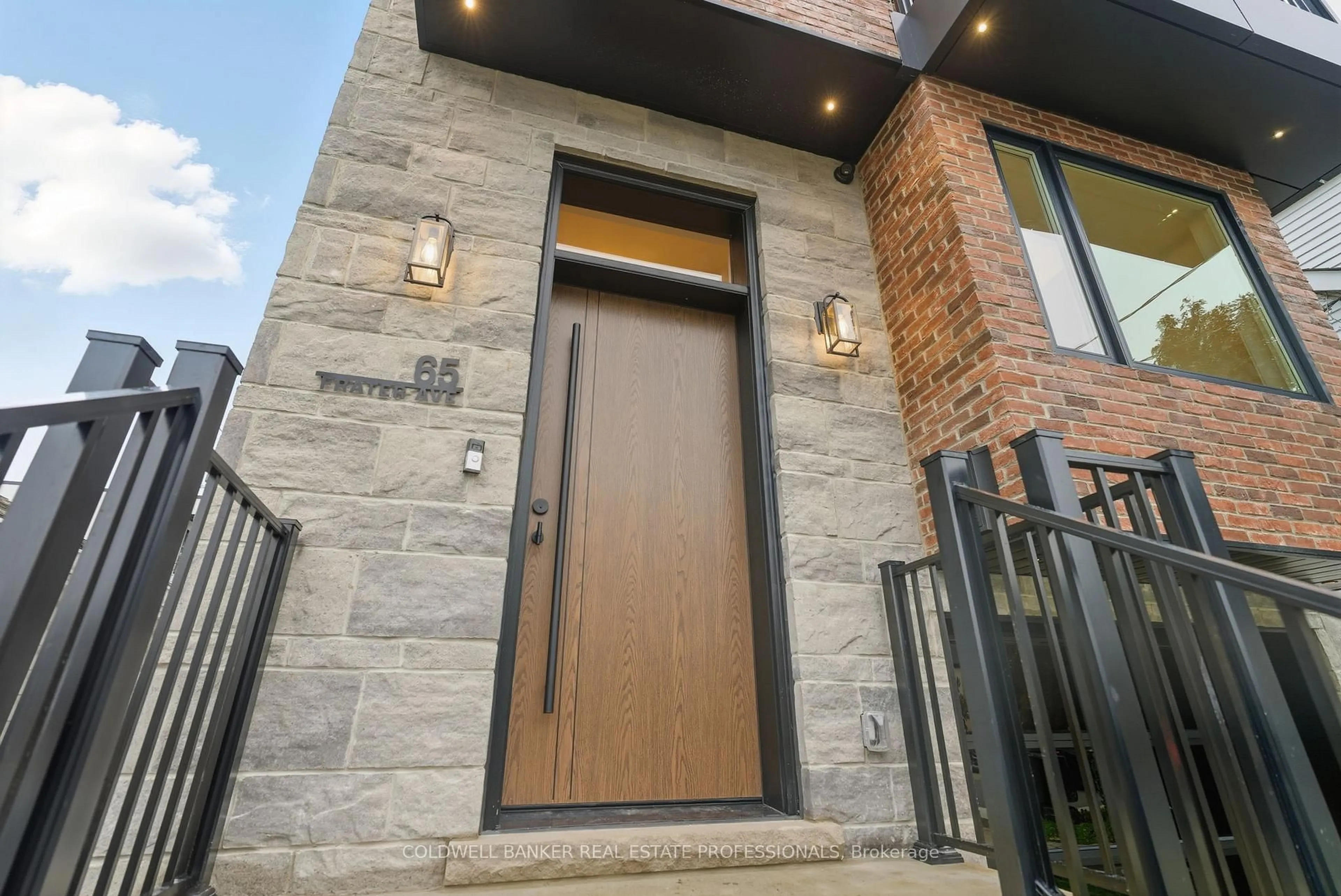 Home with brick exterior material, street for 65 Frater Ave, Toronto Ontario M4C 2H5