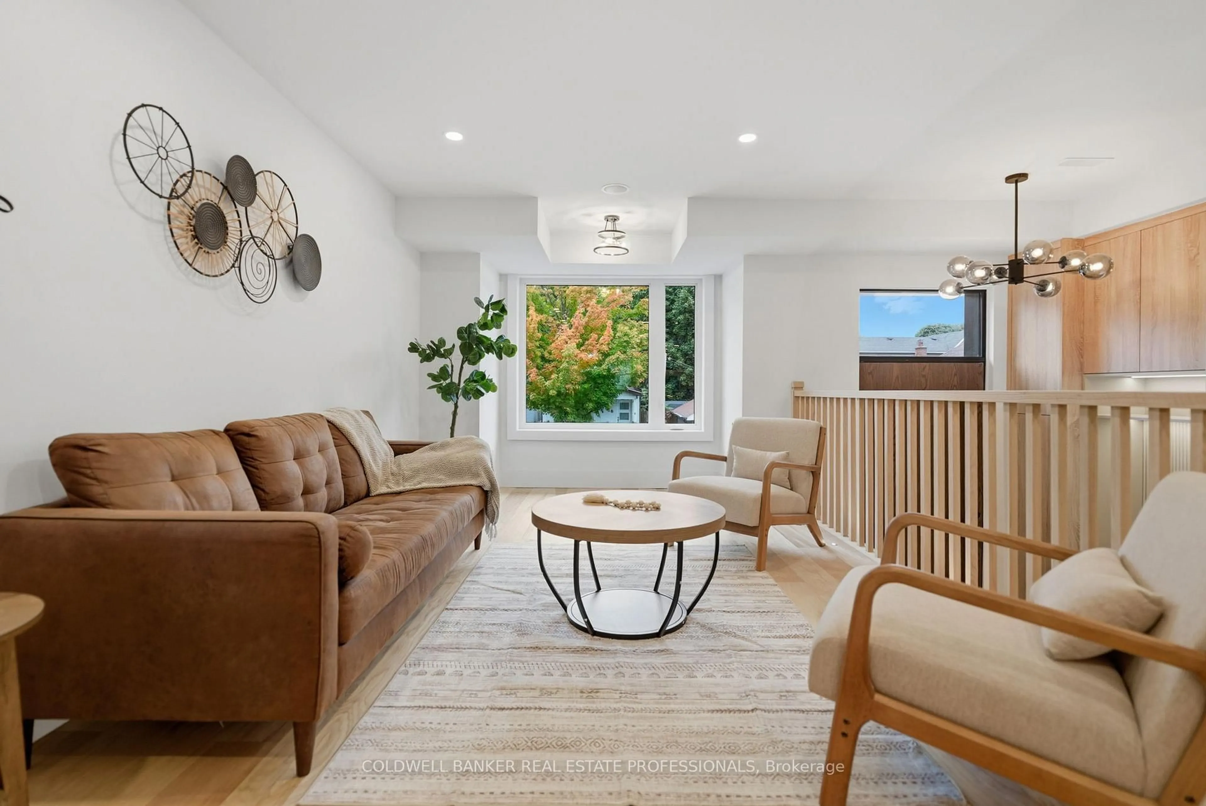 Living room with furniture, unknown for 65 Frater Ave, Toronto Ontario M4C 2H5