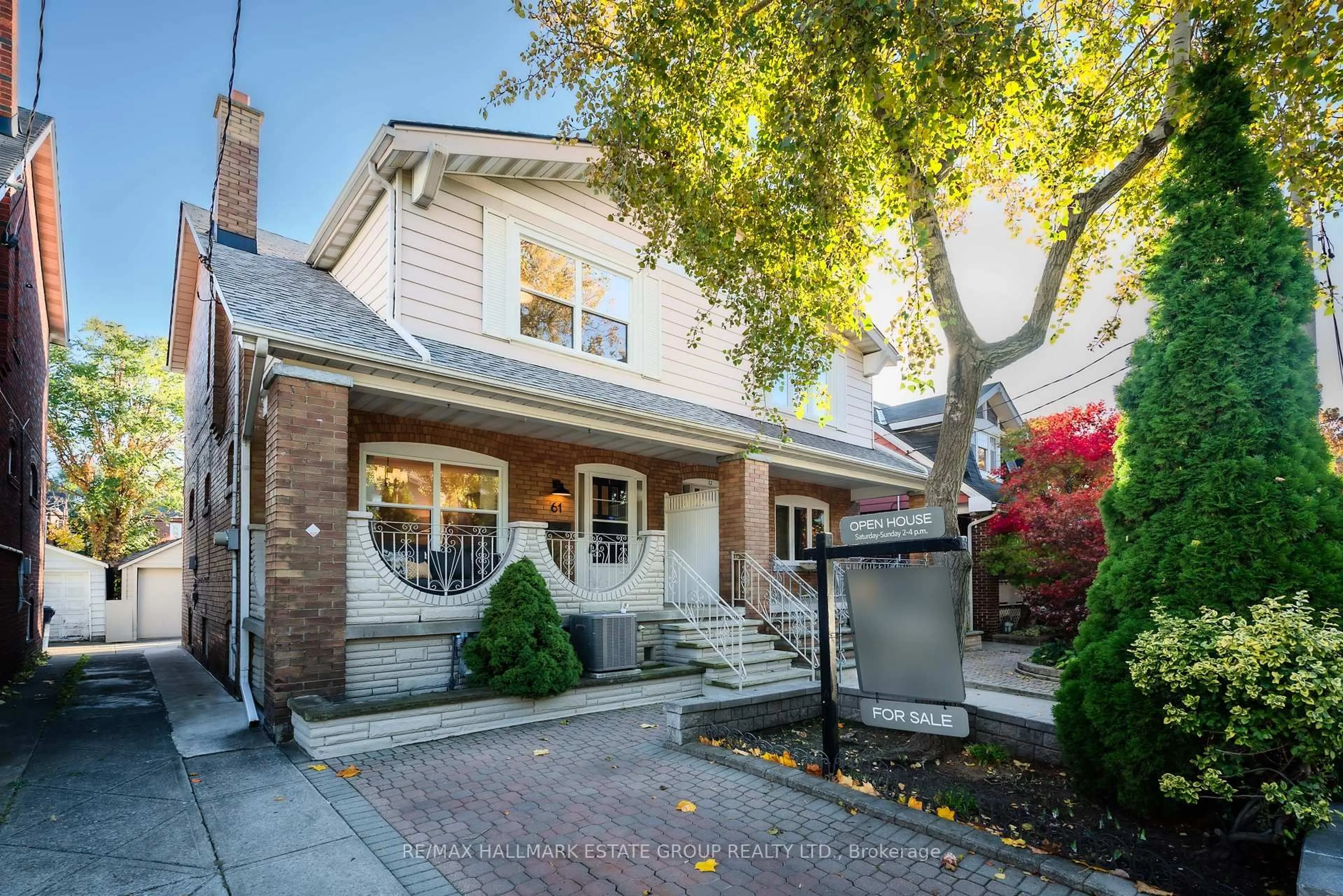 Home with brick exterior material, street for 61 Springdale Blvd, Toronto Ontario M4J 1W6