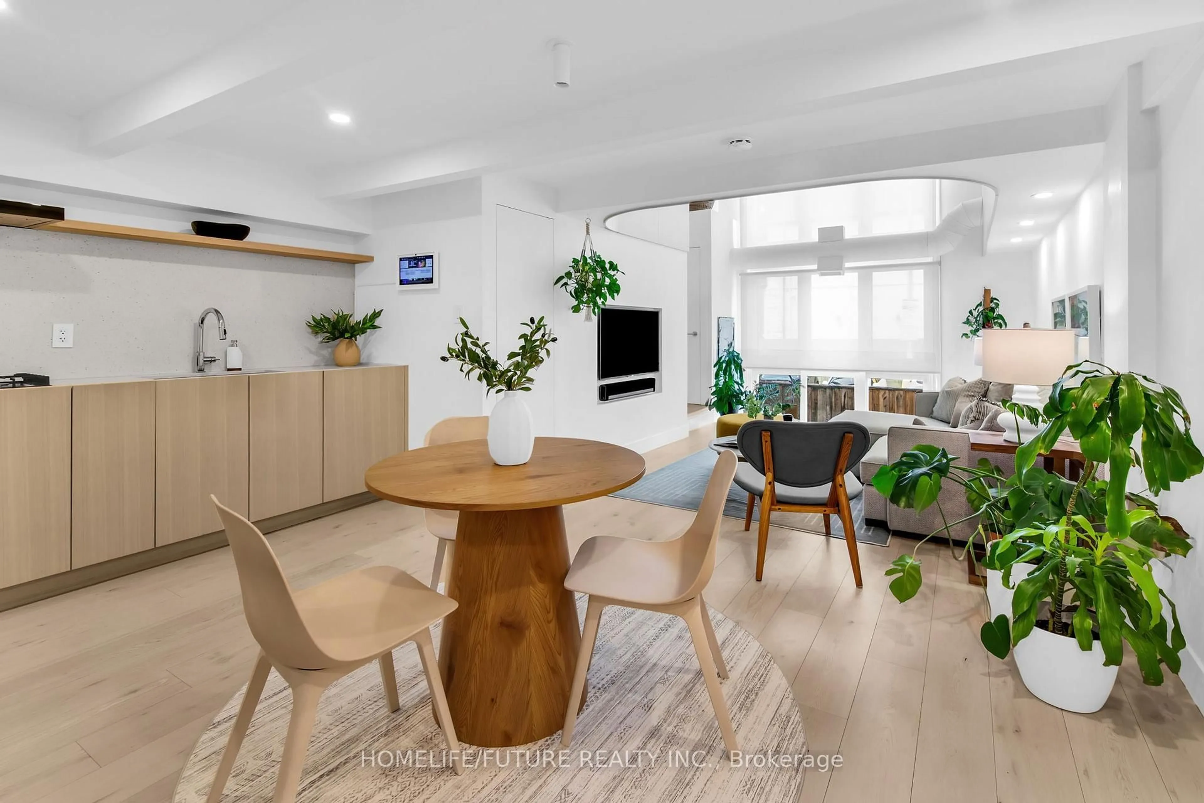 Living room with furniture, unknown for 660 Pape Ave #102, Toronto Ontario M4K 3S5